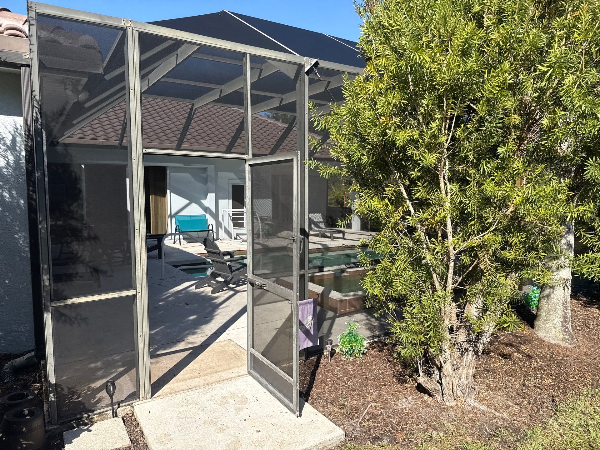 Painted Pool Deck, Lanai & Pool Cage Cleaning in River Club South – Bradenton, FL by Sunshine AquaWash