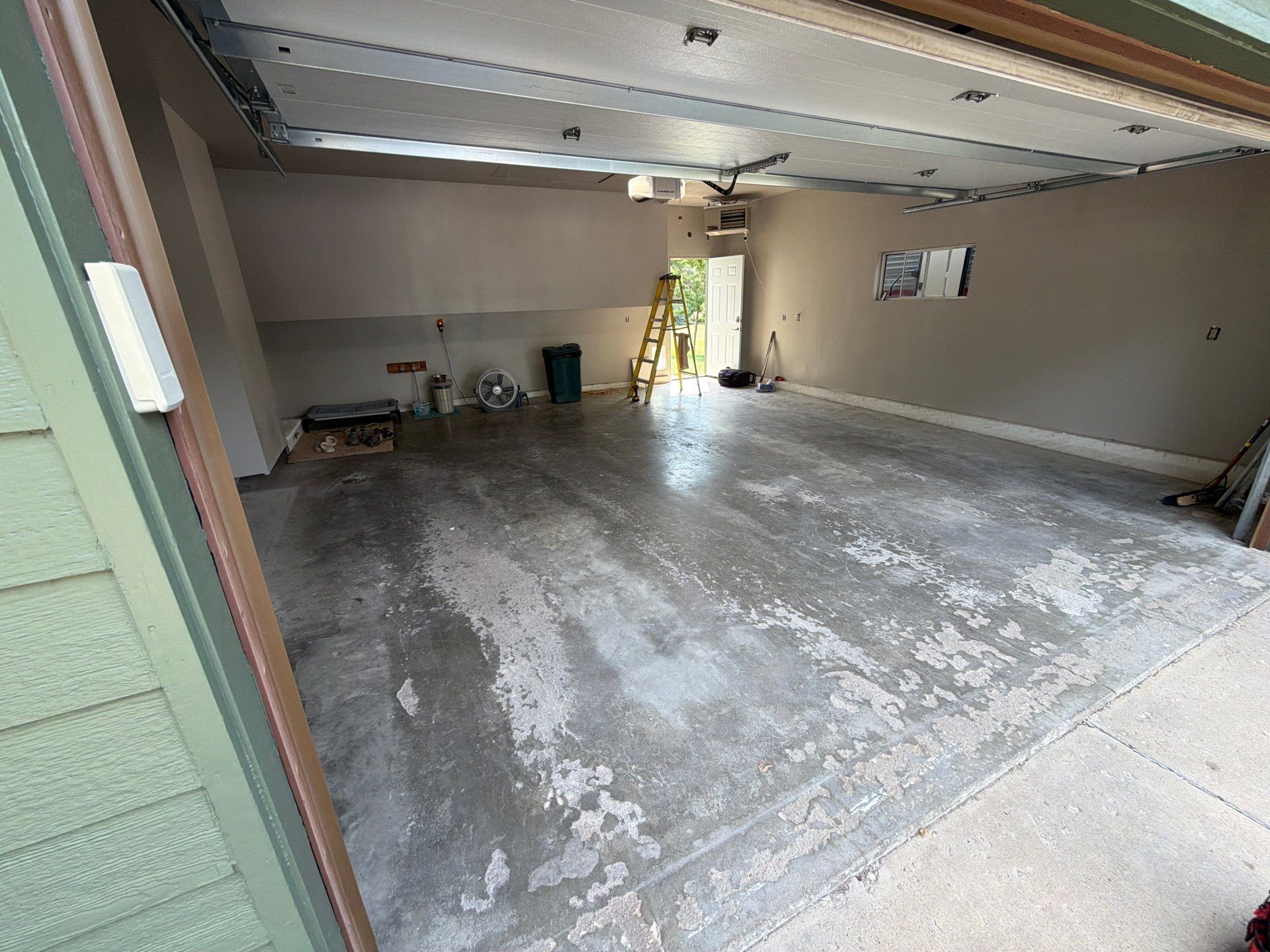 Garage Floor Coating with Decorative Flakes in Tea by Select Painting, Coatings & Garage Cabinets