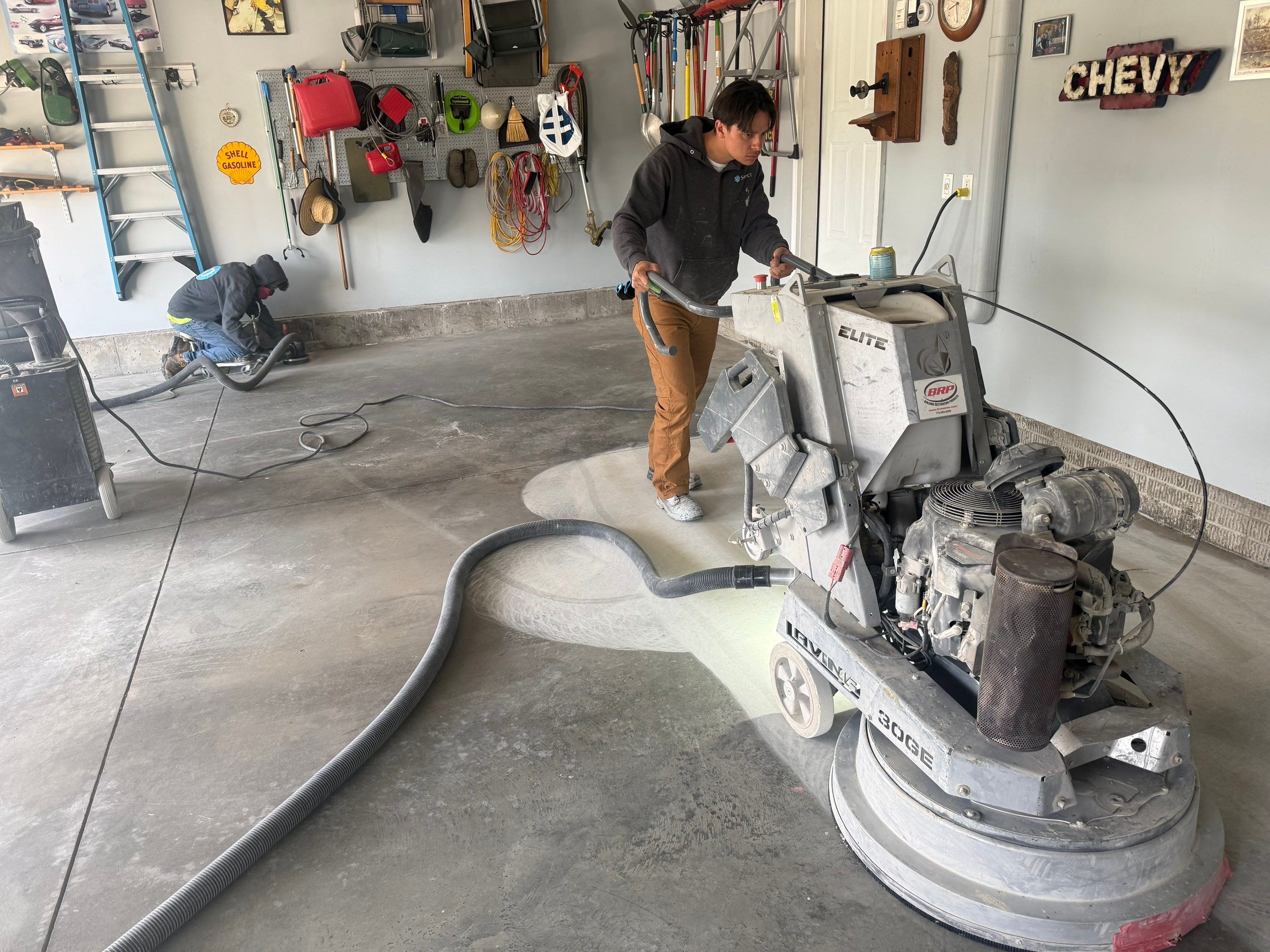 High-Gloss Epoxy Garage Floor Coating in Sioux Falls by Select Painting, Coatings & Garage Cabinets