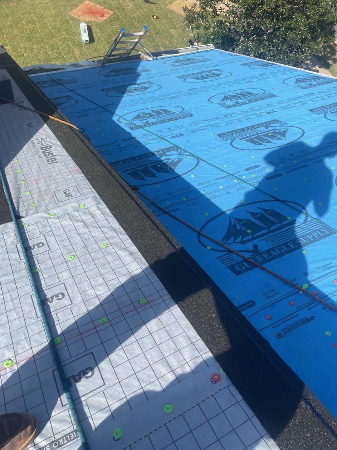 Residential Roofing Installation using Roof Replacement by American Roofing & Construction LLC