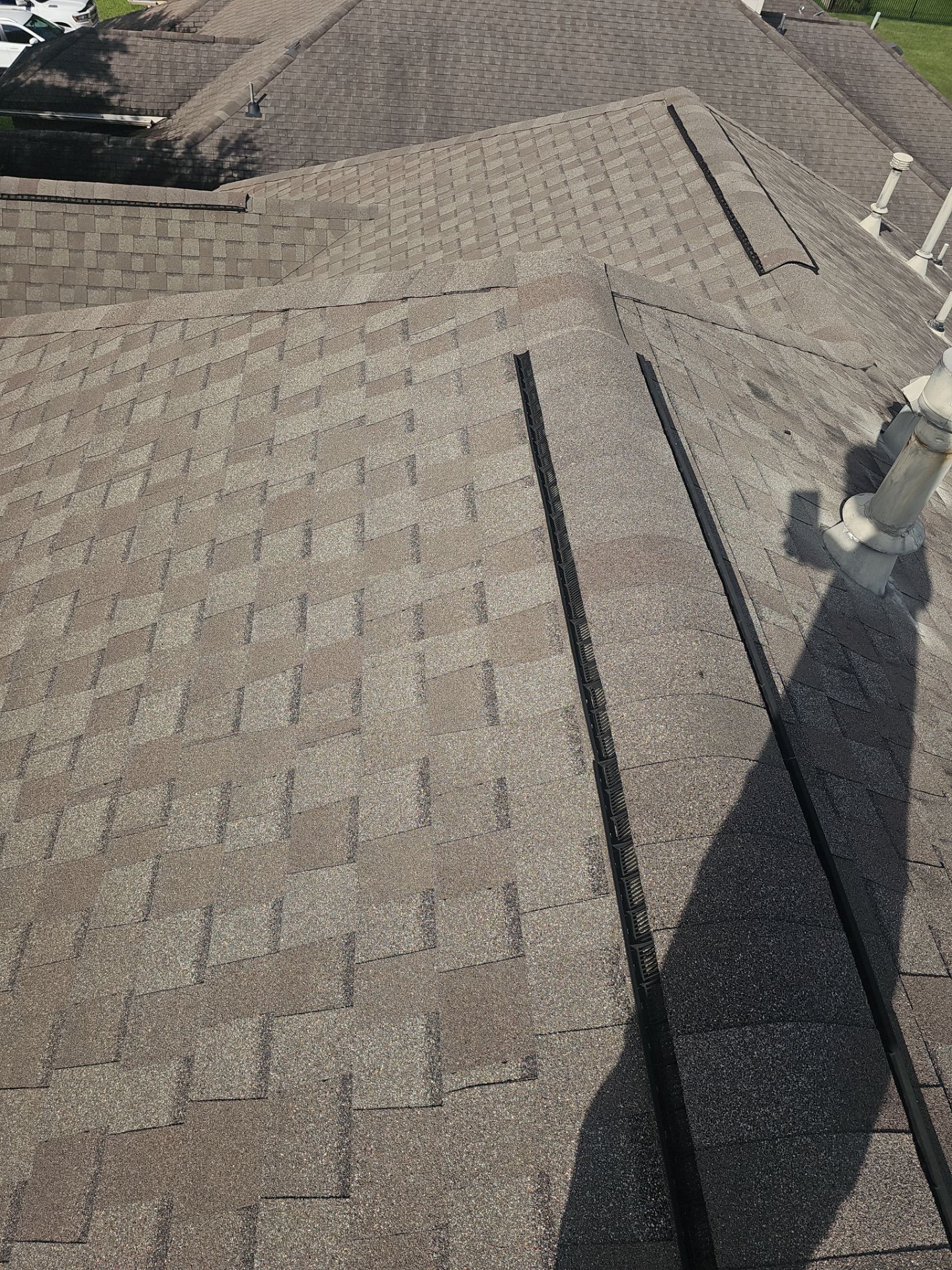 Hail Damage using Owen's Corning Duration (Lifetime) Shingles by Roof Repair Company