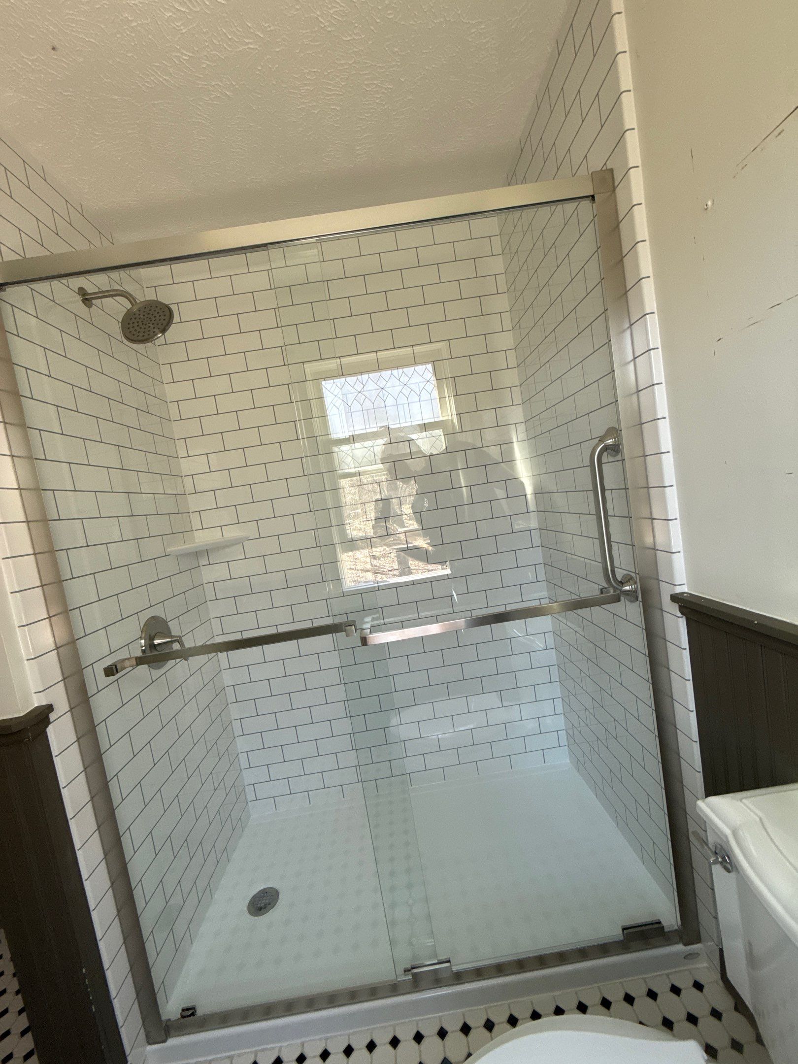 Subway Tile Shower Conversion and Bathroom Update in Traverse City by Rainbow Seamless Systems