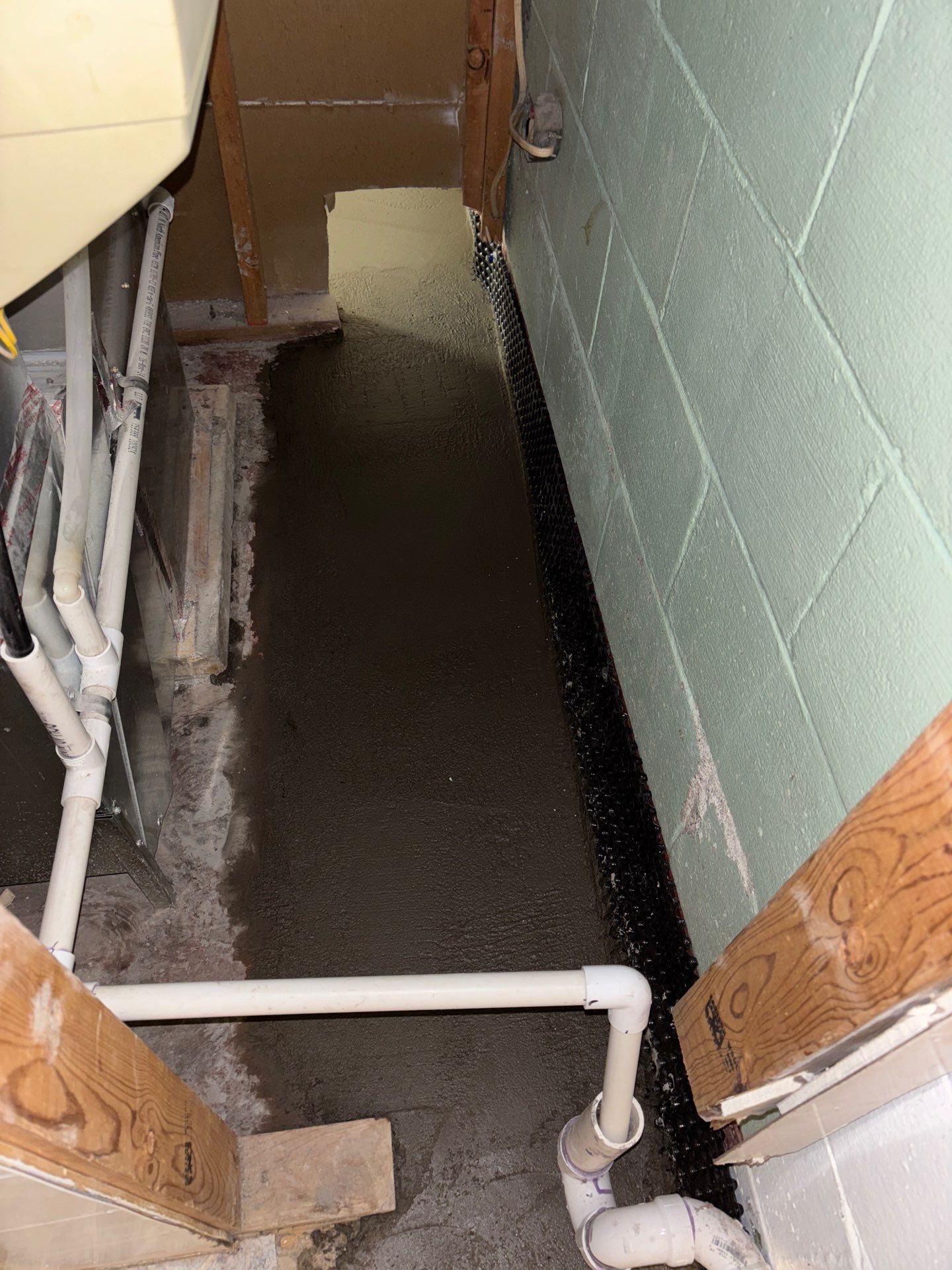 Drain Tile & a Sump Pump for our Property Management Partner by Waterproofing Northeast