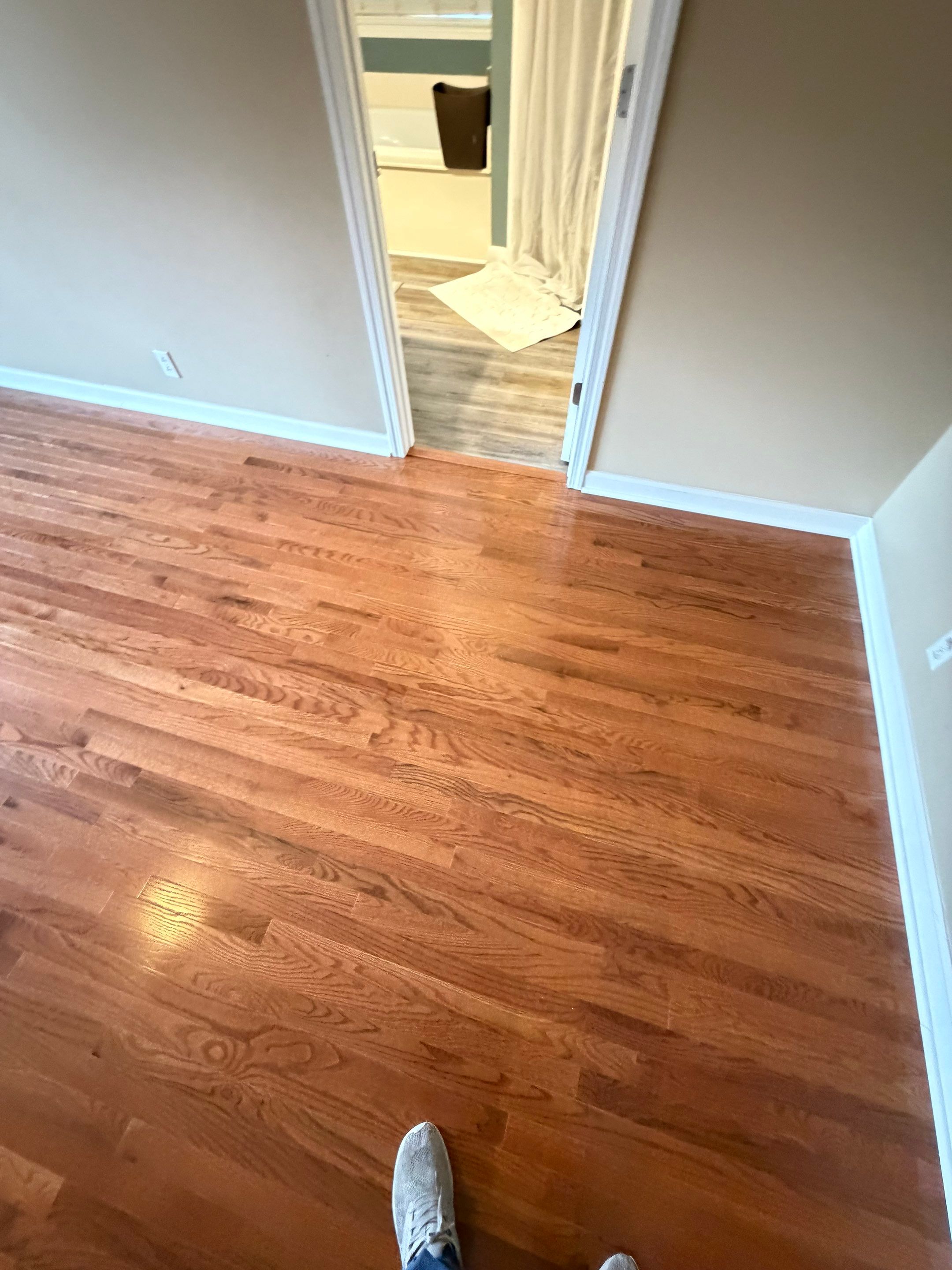 From carpet to prefinished hardwood by Footprints Floors of Nashville