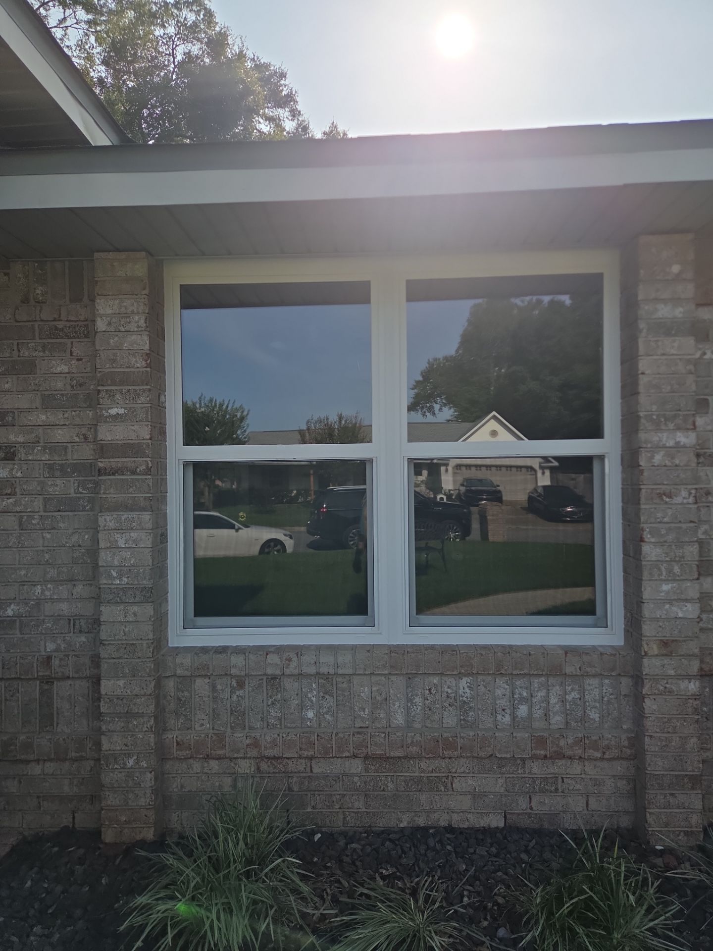“New windows, new view, same great house!” by Folkers Window Company