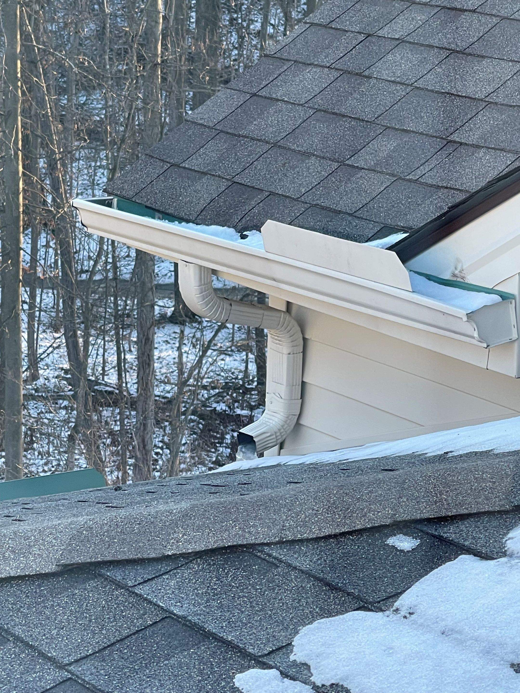 Icedamn Heat Cables and gutter guards by Absolute Roofing and Construction