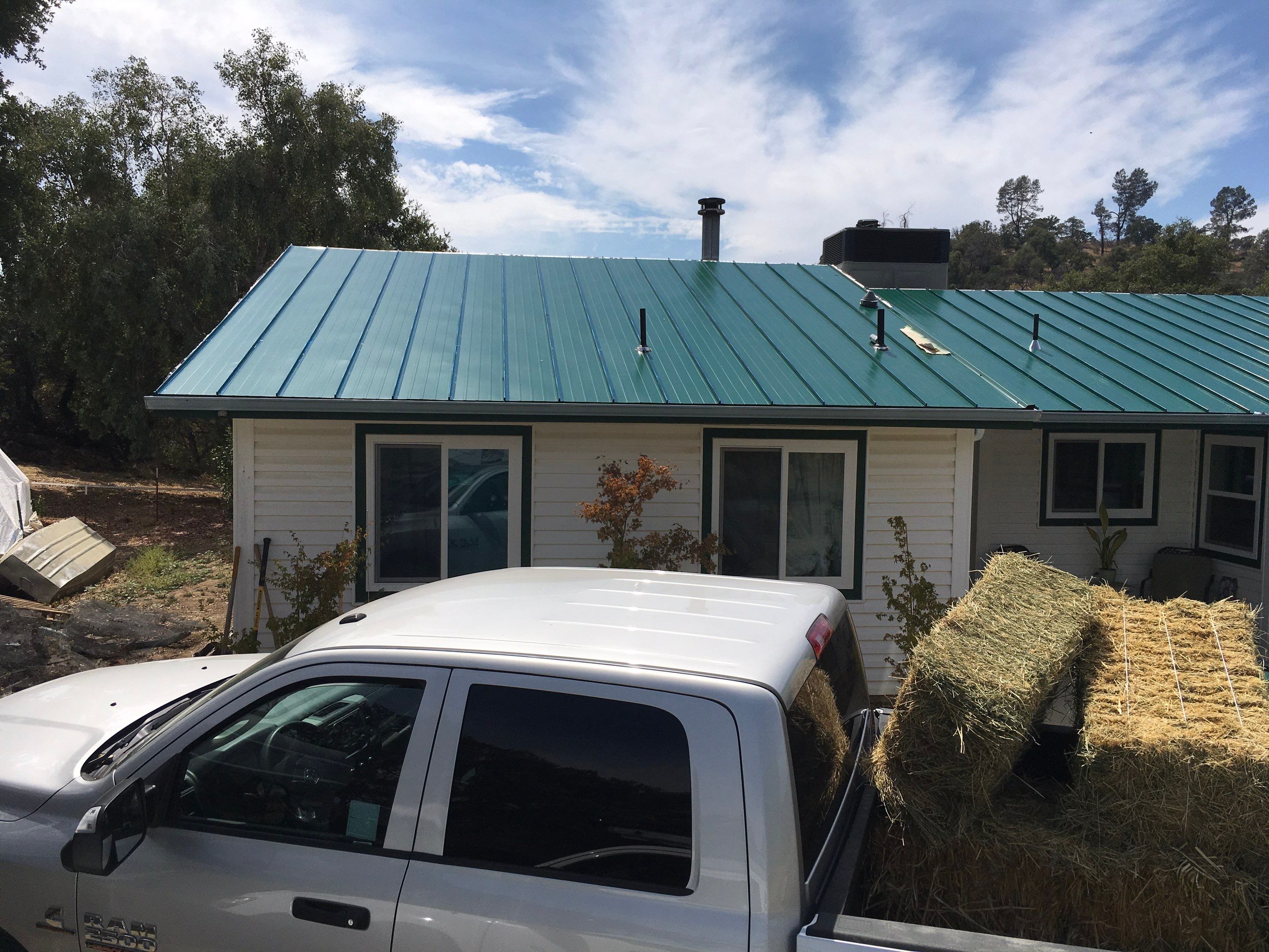Metal roofing installation using Standing seam metal roofing system by Straight Edge Roofing Inc