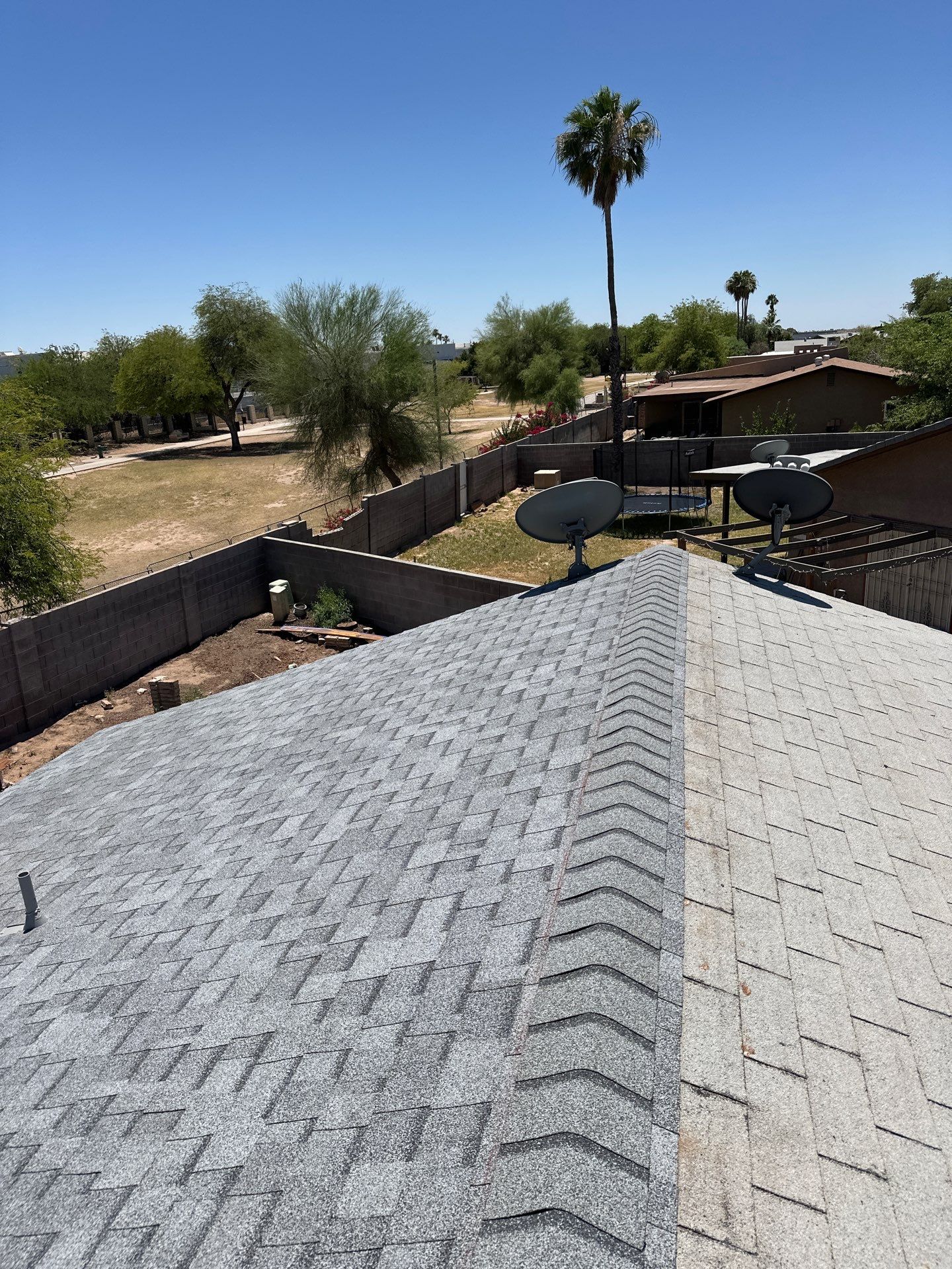 Estate Gray Shingles by Reimagine Roofing