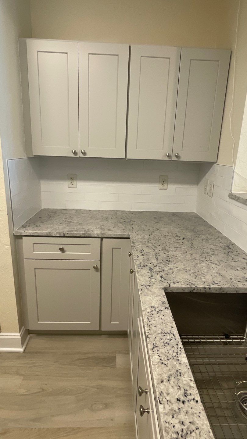 Home Remodel using LVP Flooring and Cabinets by HandyMangum