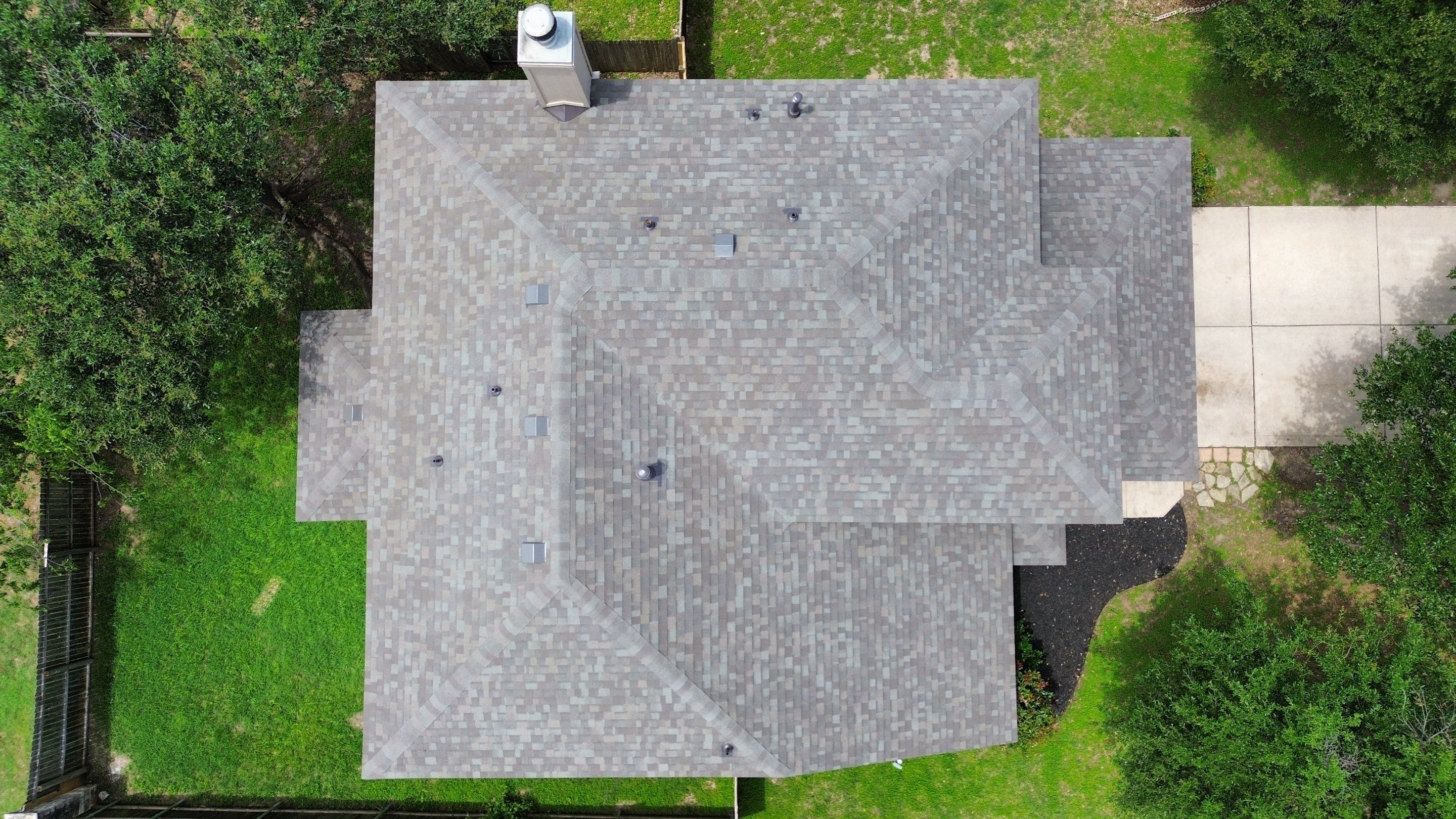 Roof Replacement & Chimney Cricket Upgrade in Cedar Park, TX by Kstylez Roofing & Construction