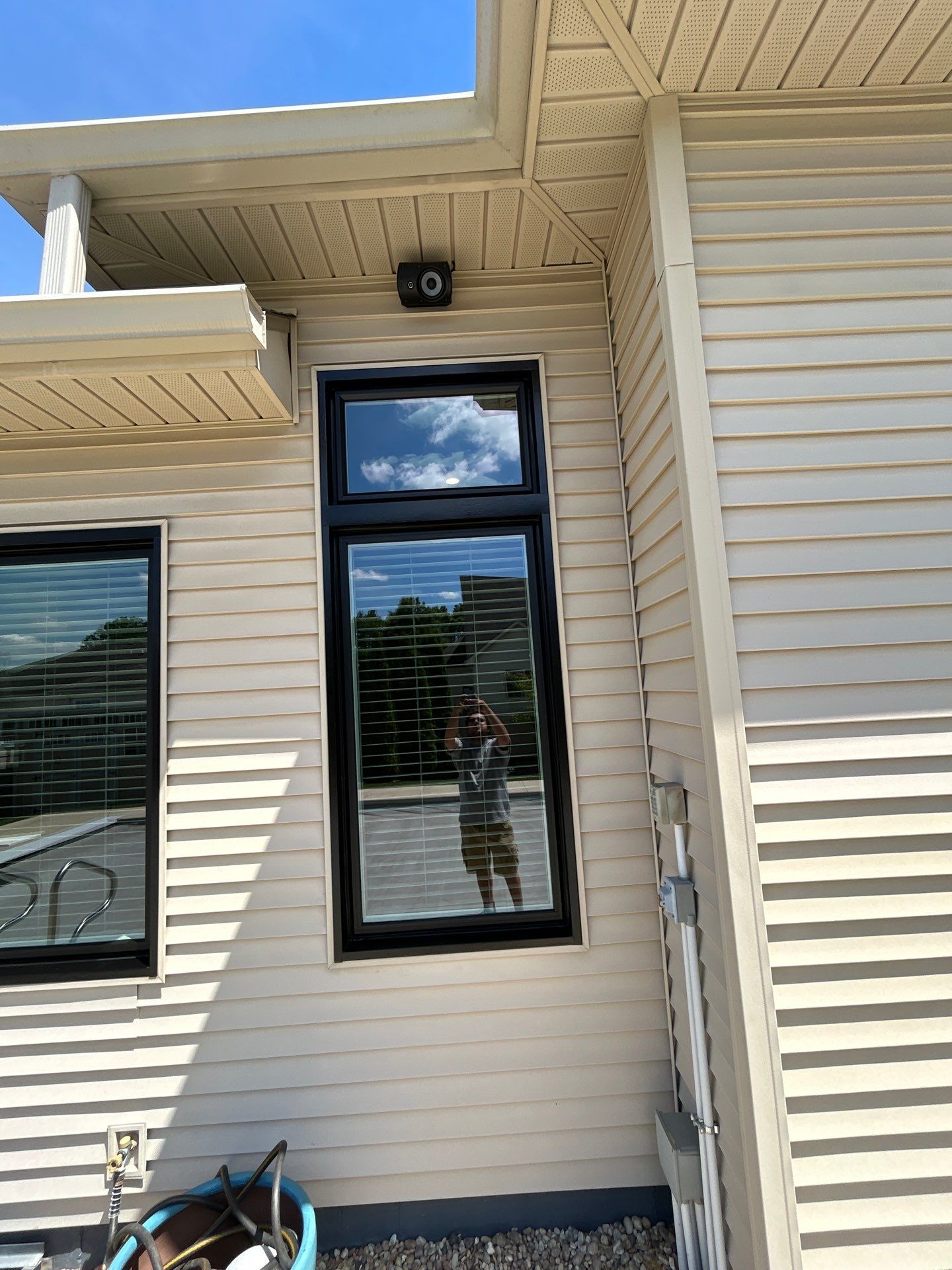 Black Vinyl Window Installation by Merrifield Exteriors, LLC
