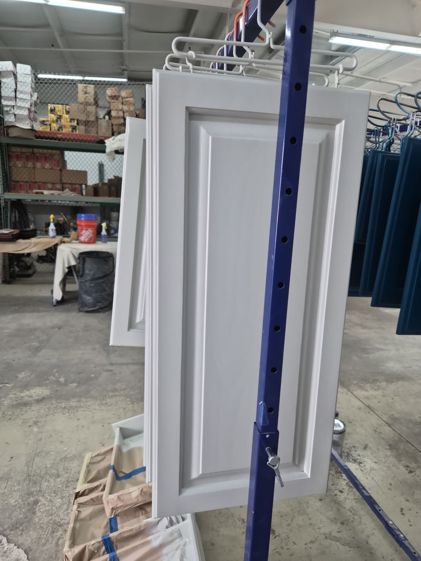Two-Tone Kitchen Cabinet Refinishing and Granite Countertop Installation by Top Shelf Painter