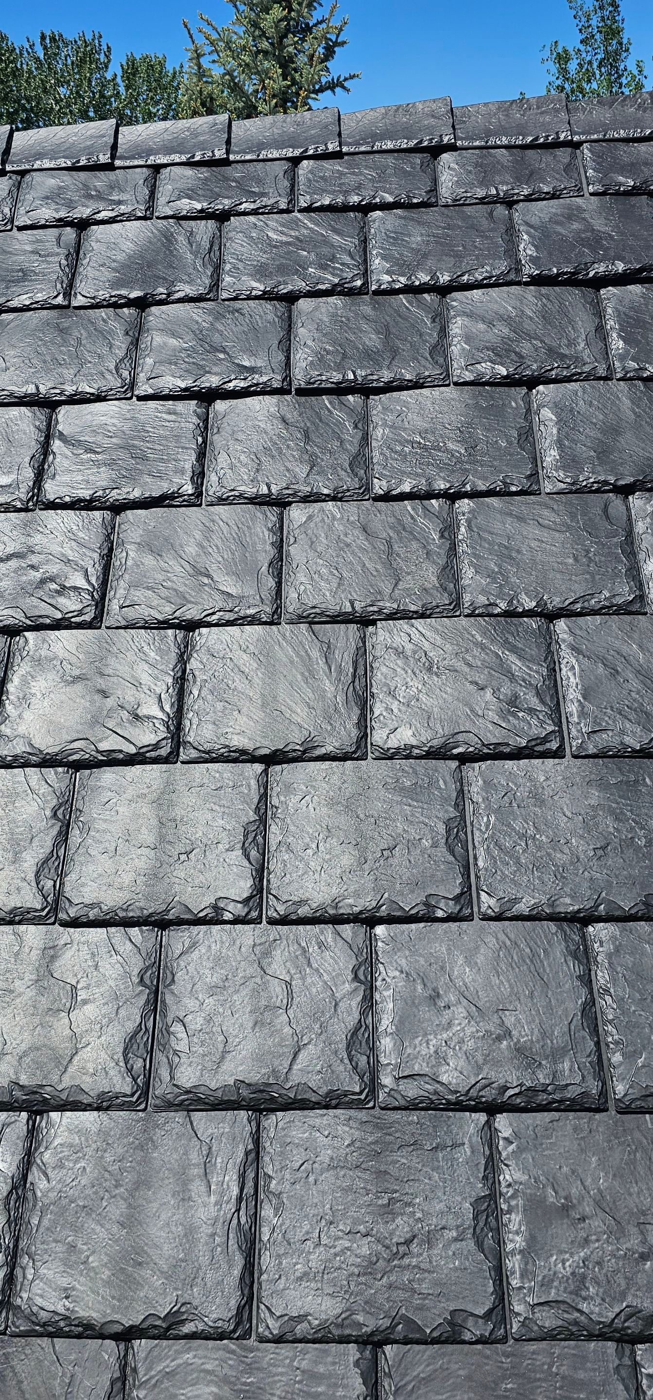 Residential Roofing Installation using Brava Synthetic Slate in Bozeman, MT by swagg construction