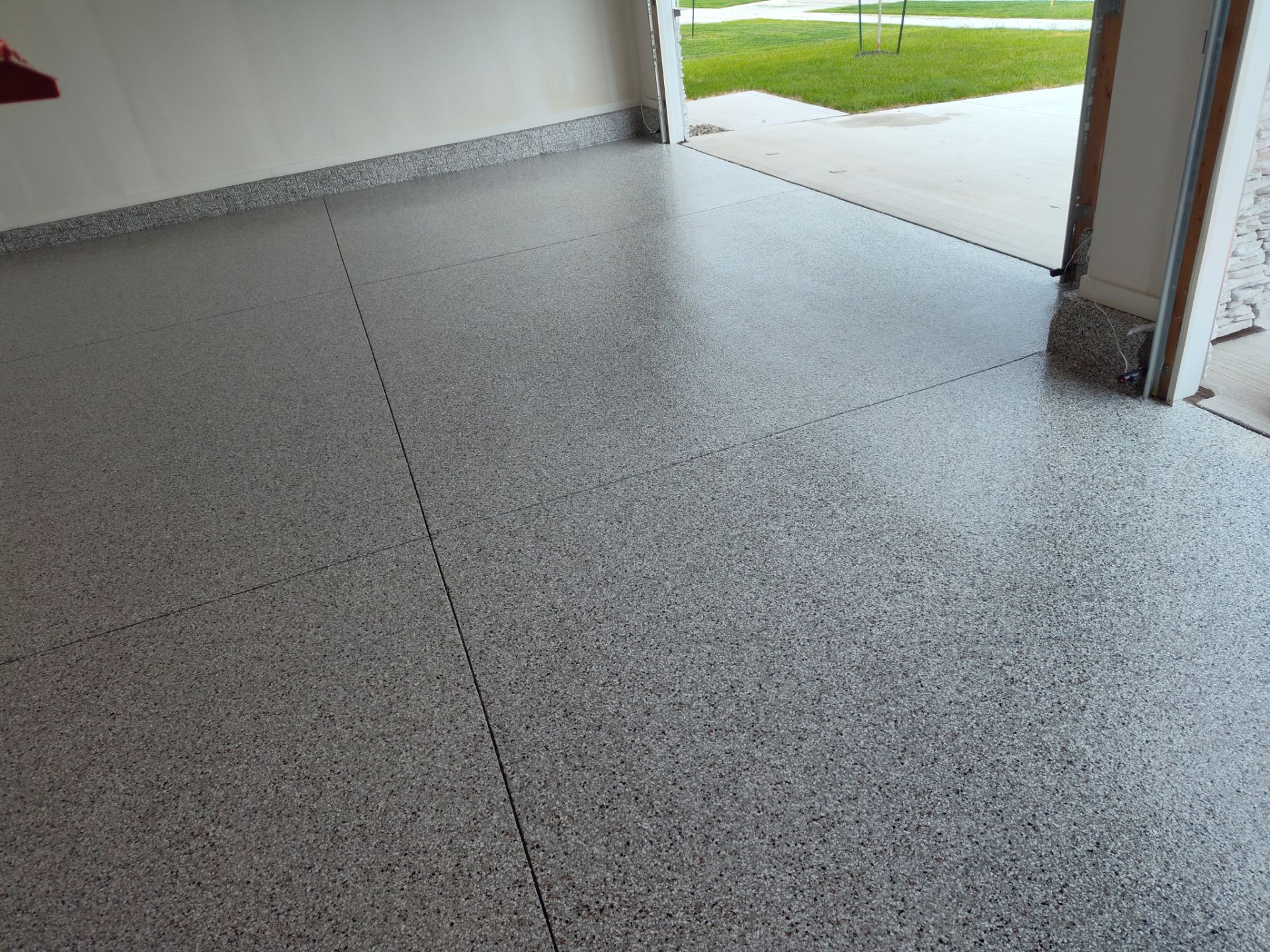 New Bondurant Garage Floor Coating by Revival Concrete Coatings, LLC