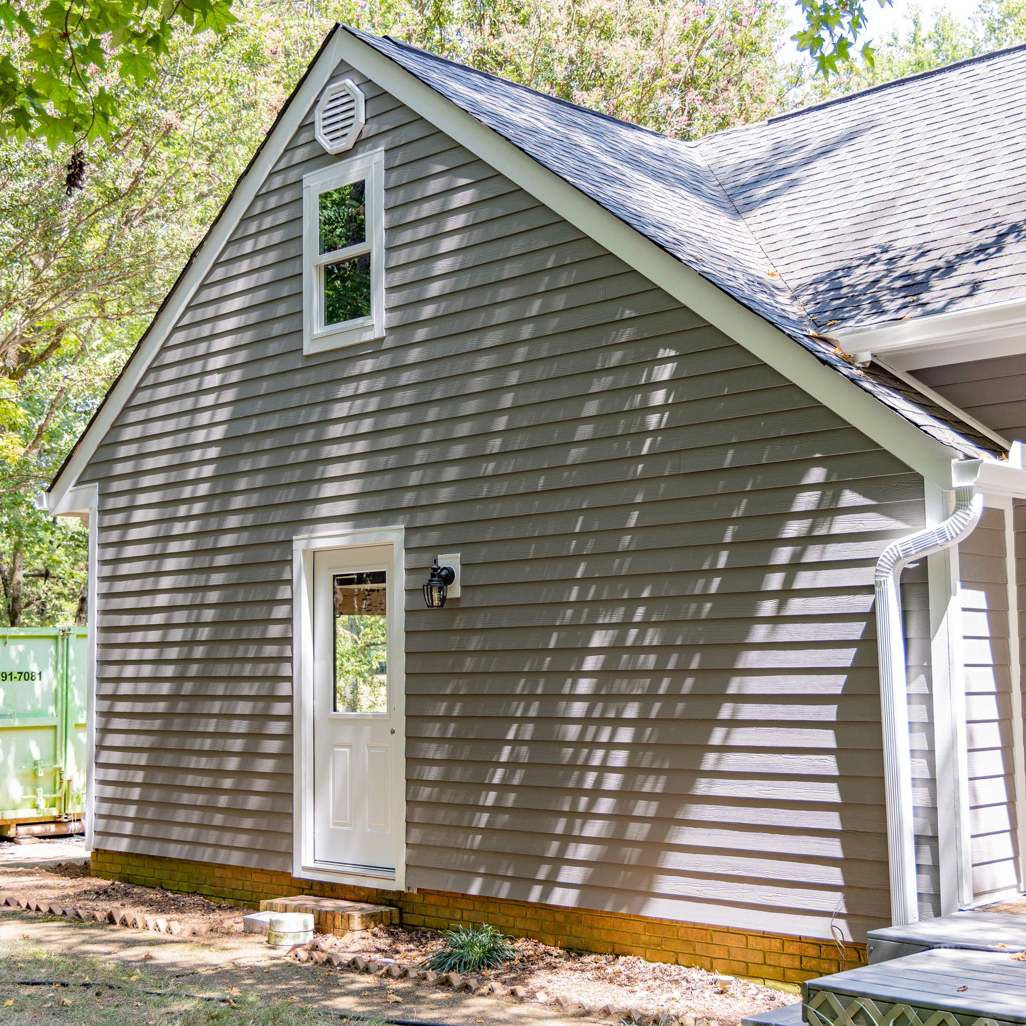 Aged Pewter Hardie + Windows by Freedom Exteriors