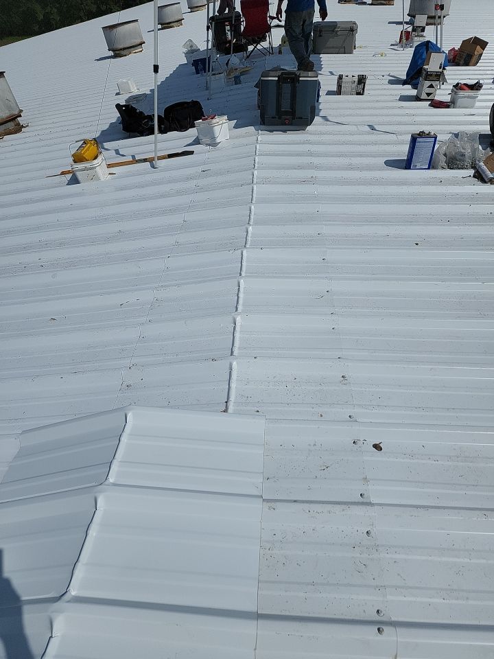 Commercial Roofing Installation using Aluminum Roofing panels by Hostetler Roofing