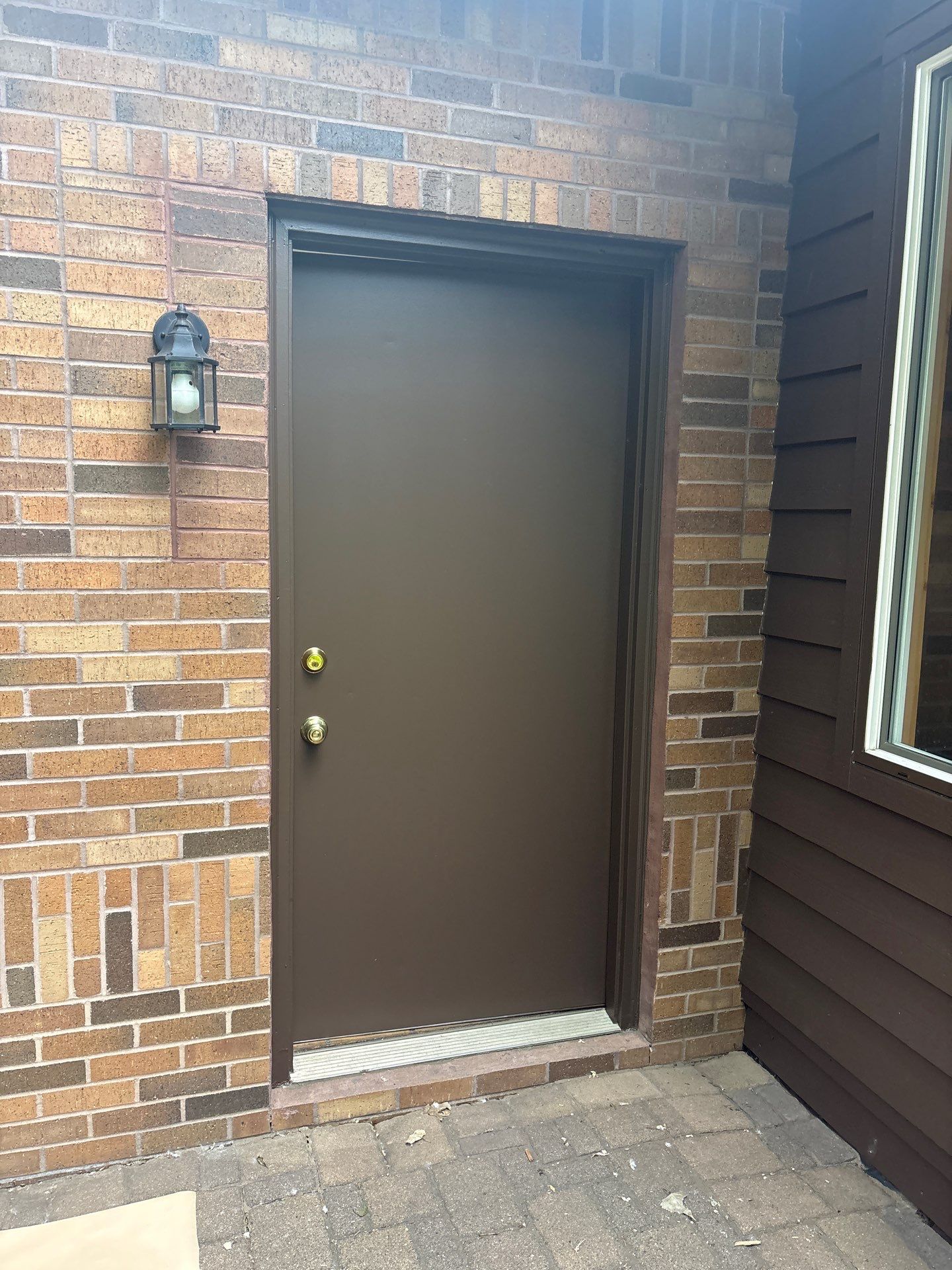 Sioux Falls Exterior Painting and Solid Color Deck Staining by Select Painting, Coatings & Garage Cabinets