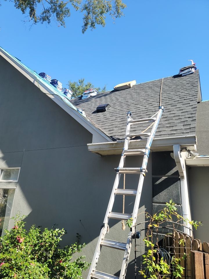 Residential Roofing Installation using Roof Replacement by American Roofing & Construction LLC