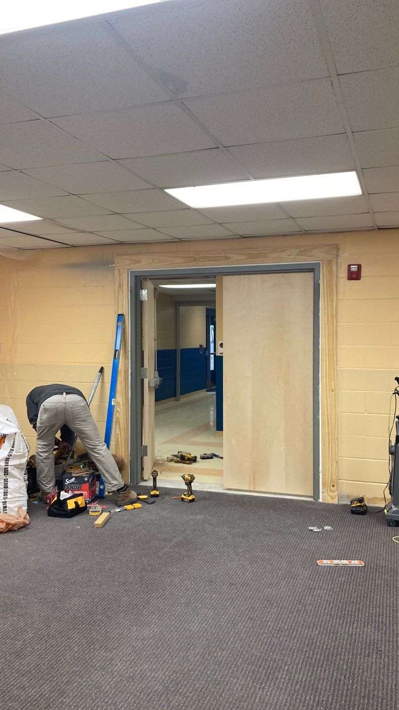 Wall Repair and Door Installation by Dodson House Moving