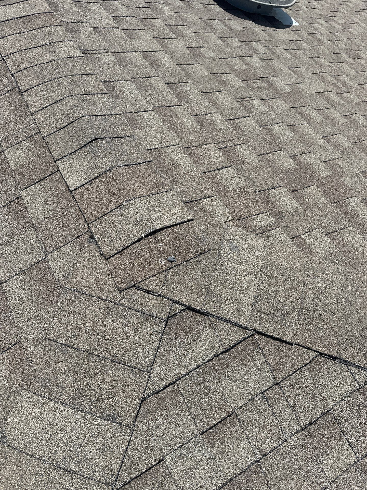 Roof Damage  by Zeus Exteriors
