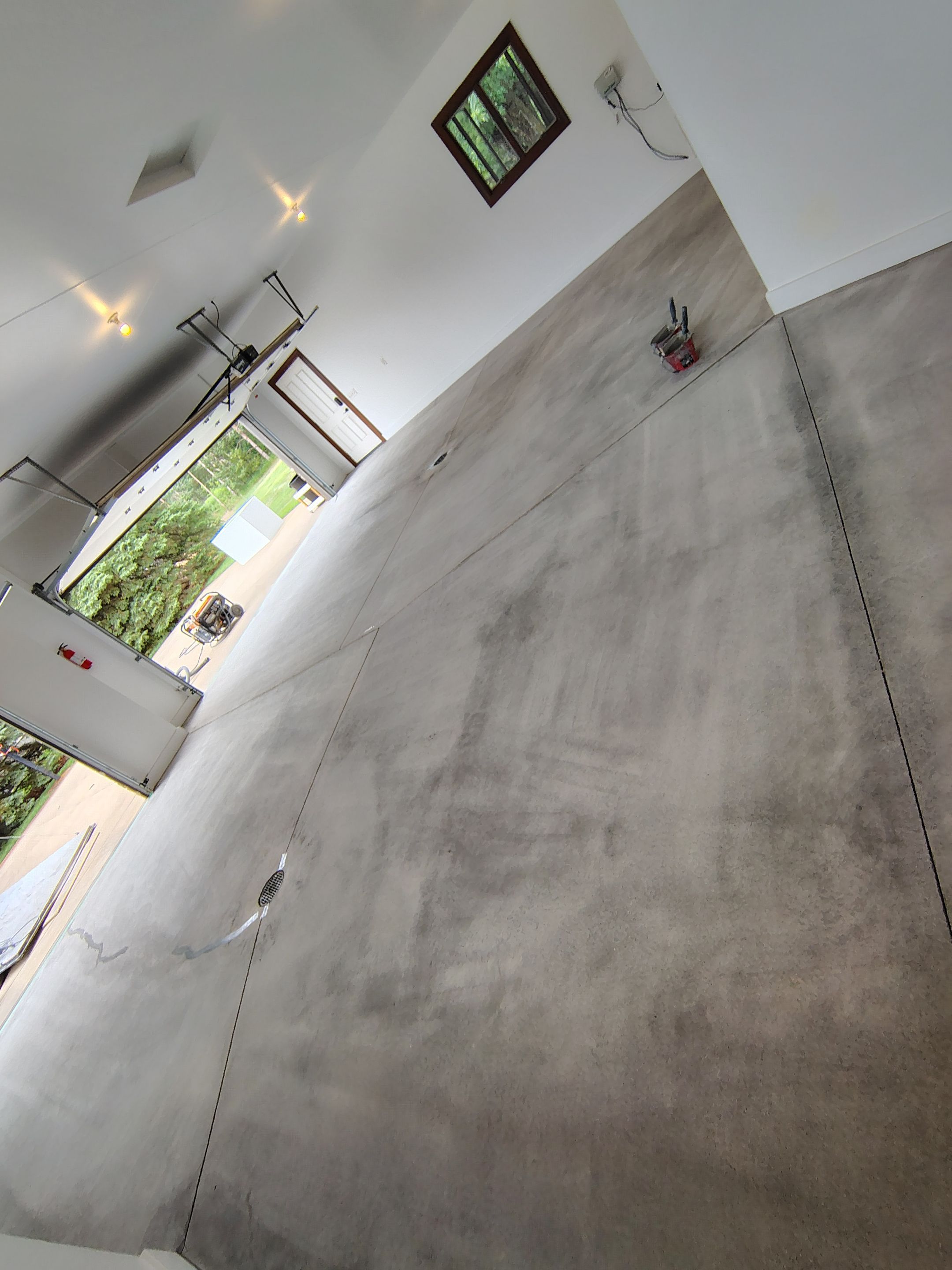 Feather Grey Floor Coating in Sioux Falls, SD by Select Painting, Coatings & Garage Cabinets