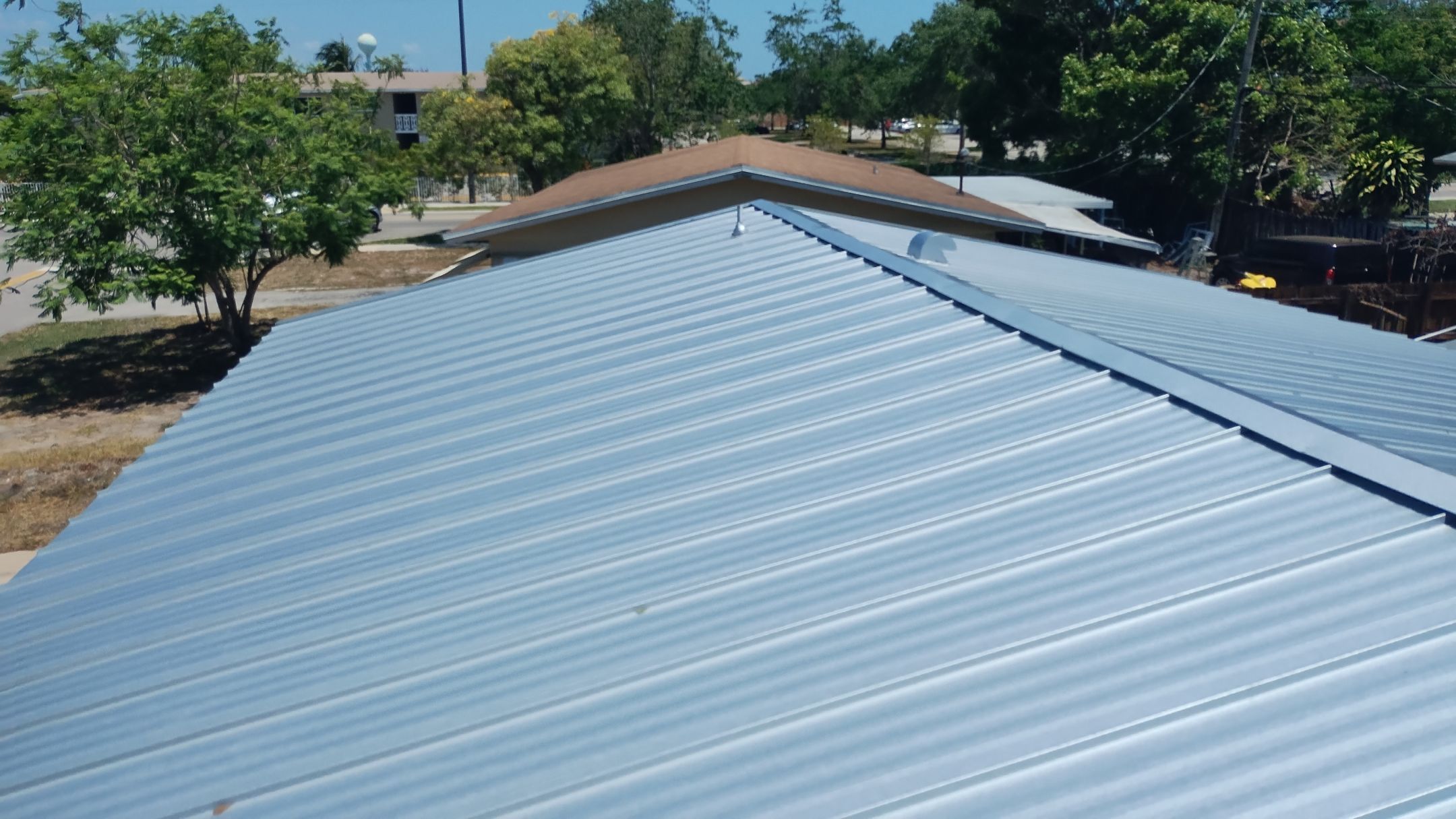Residential Roofing Installation using 1" Nail strip metal roof by BLUES BROTHERS ROOFING
