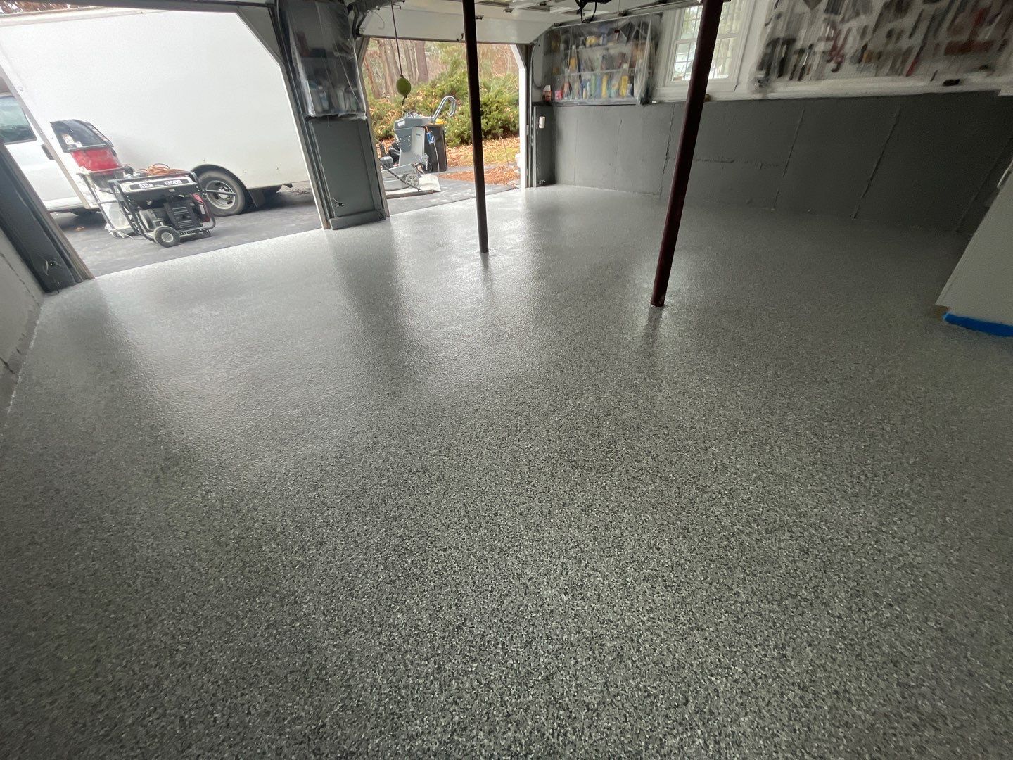 Maestranzi Garage TransFLOORmation by Symphony Concrete Coatings
