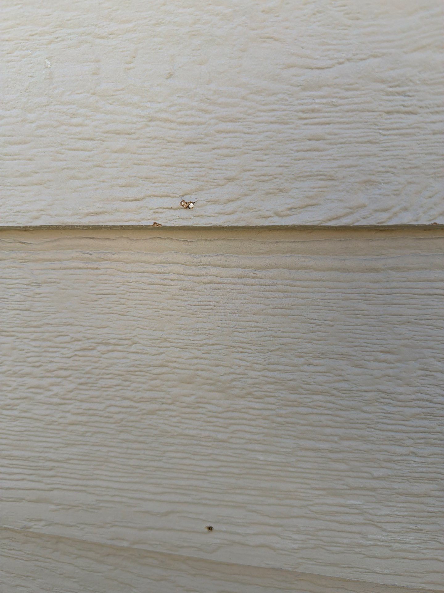Residential Exterior Painting and Siding Refresh in Sioux Falls by Select Painting, Coatings & Garage Cabinets
