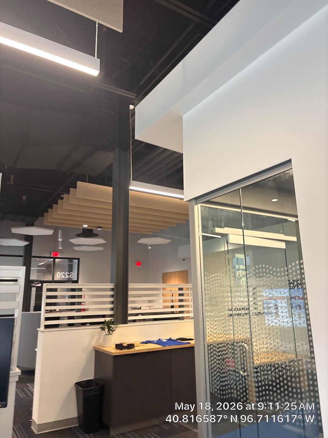 Modern Office Interior Fit-Out with Acoustic Baffles in Lincoln by CompanyCam Sales Demo