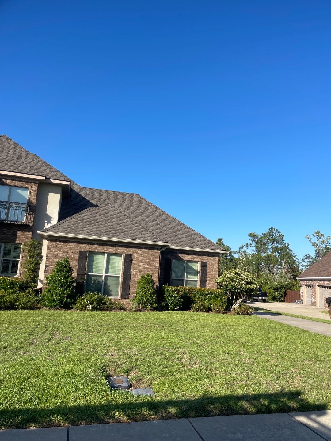 Residential Roofing Installation using Roof Replacement by American Roofing & Construction LLC