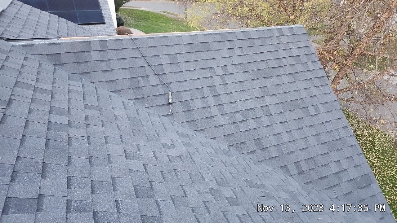 Residential Roofing Installation using Certainteed Landmark Moire Black by A Plus Exterior