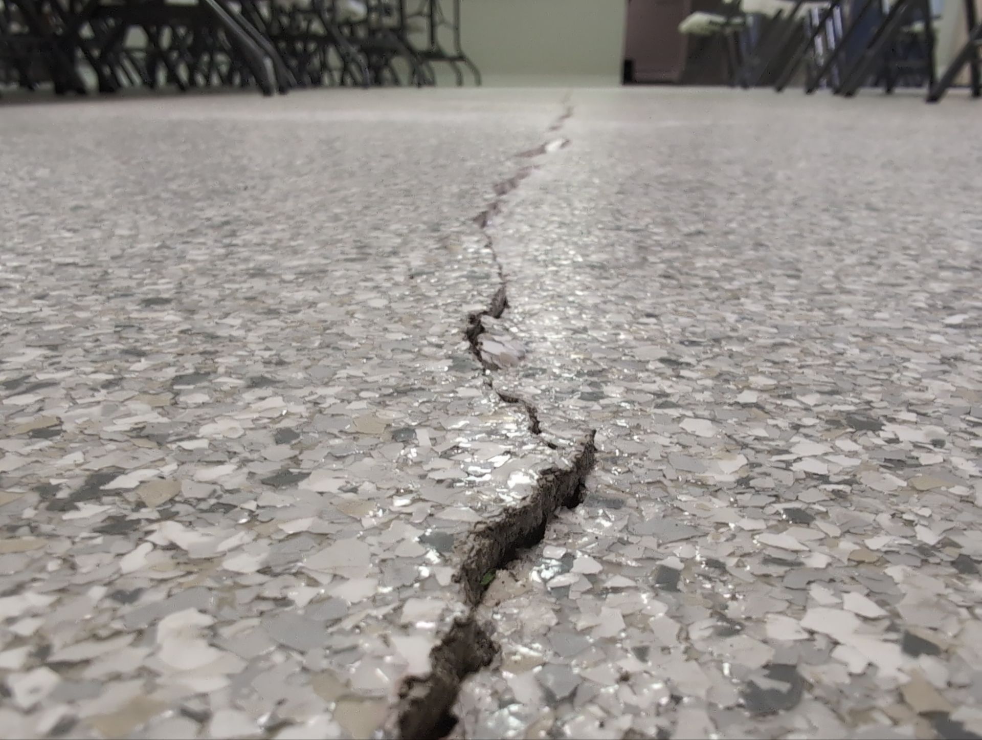 Medina Cracked basement floor with Epoxy by Beck Restoration Management Group