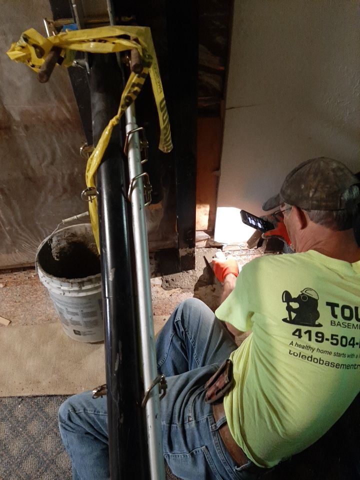 Exterior Deep Waterproofing System with Wall Push Back and Steel Beams Reinforcement by Toledo Basement Repair