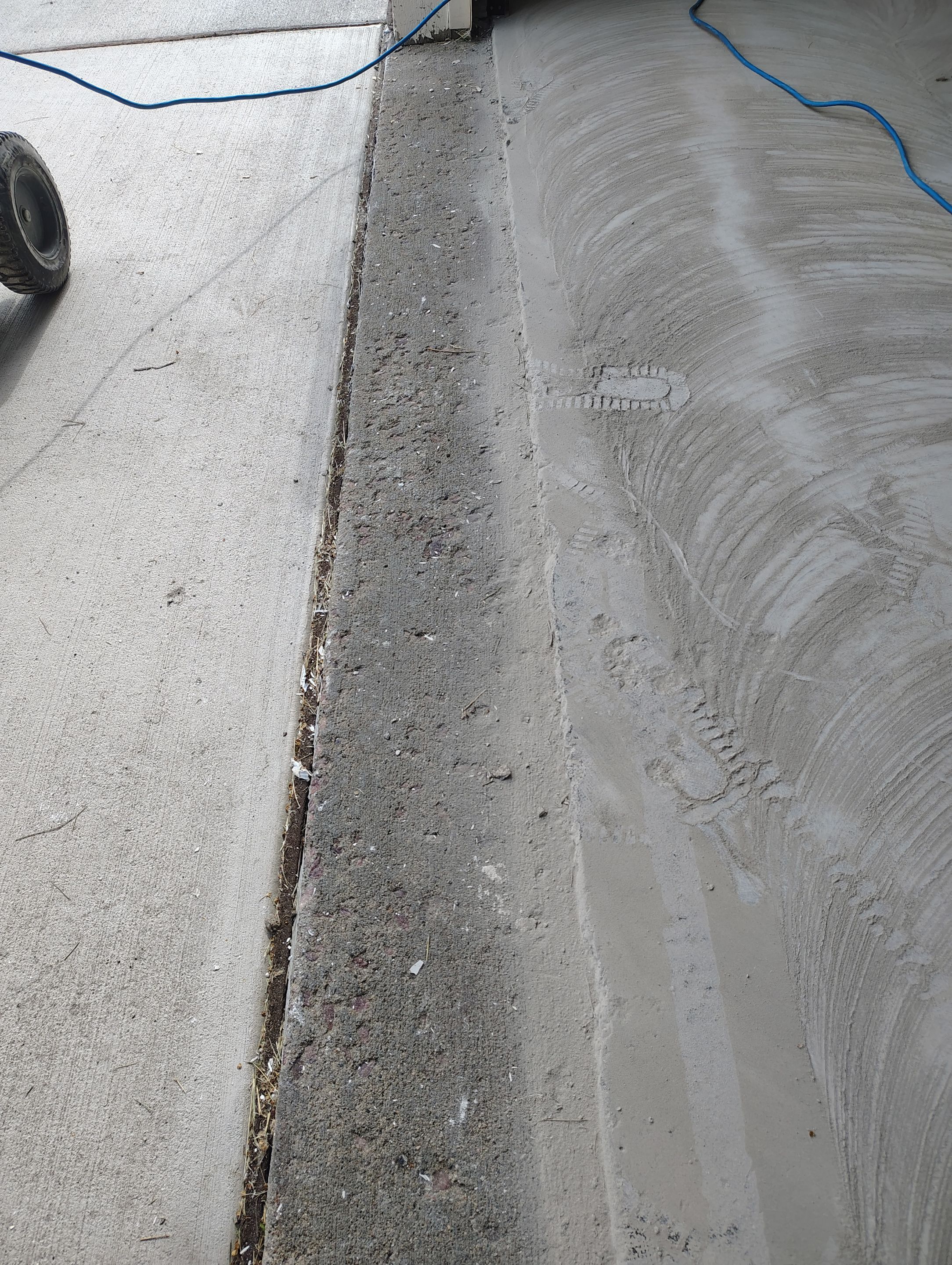 Custom Grey Speckled Epoxy Floor Coating for Sioux Falls Garage by Select Painting, Coatings & Garage Cabinets