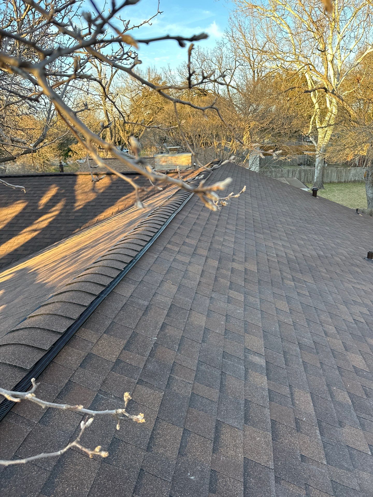 Residential Roofing Installation using Owens Corning Oakridge Brownwood by DeZign Roofing & Exteriors