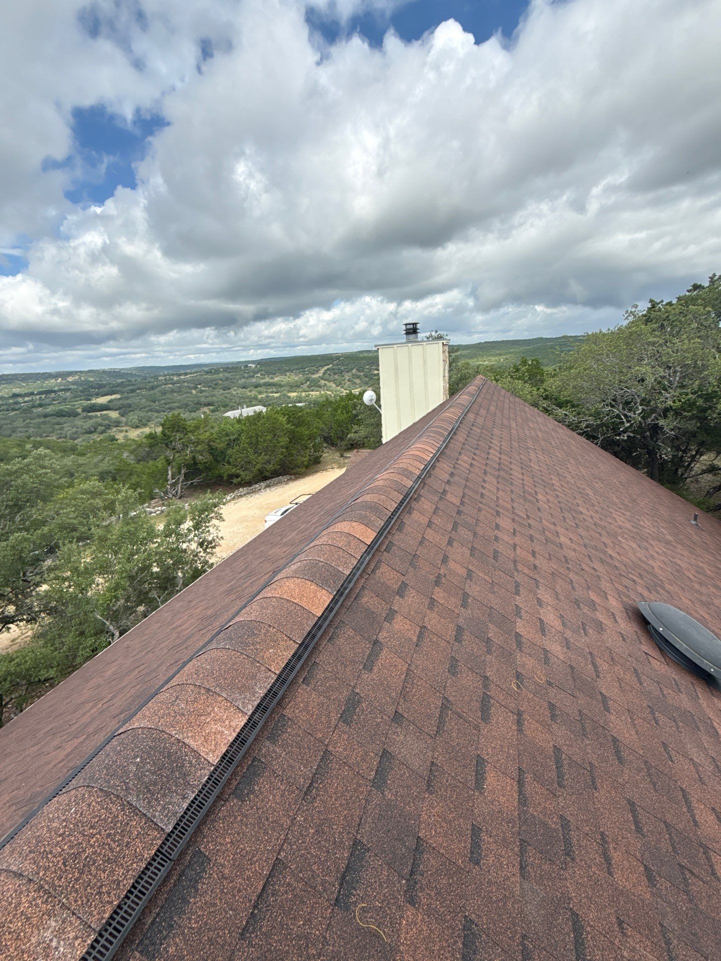 Residential Construction using TAMKO - Titan XT - Rustic Hickory by Action Exteriors Austin