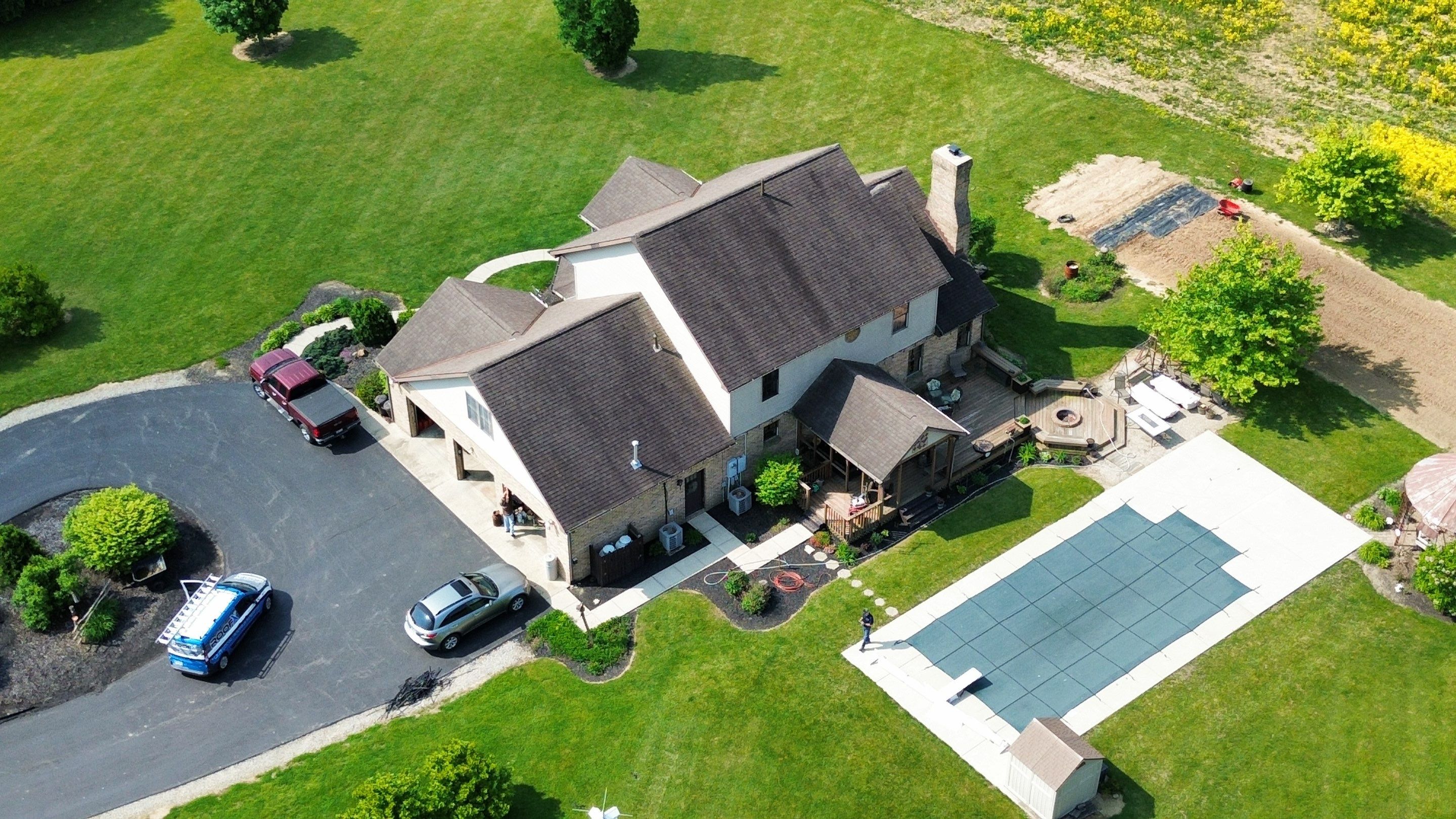 Residential Roofing Installation using Performance Panel Metal - Burnished Slate by RoofX 