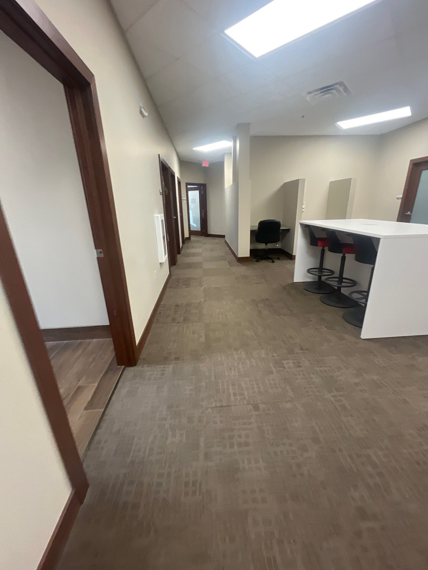 Commercial Office Interior Remodel and Modern Suite Refresh in Sioux Falls by Select Painting, Coatings & Garage Cabinets