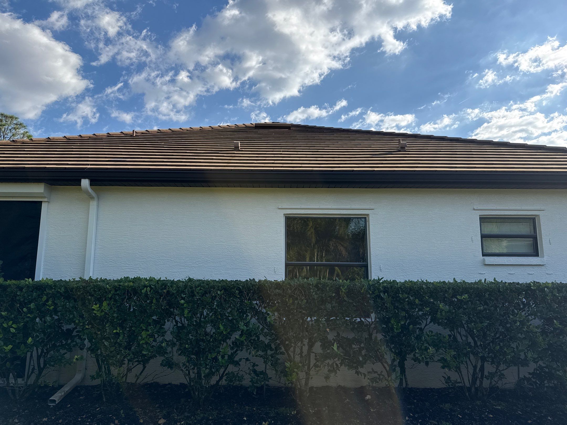Flat Tile Roof, Paver Pool Deck & Driveway Cleaning | Cove at Twin Rivers, Parrish FL by Sunshine AquaWash