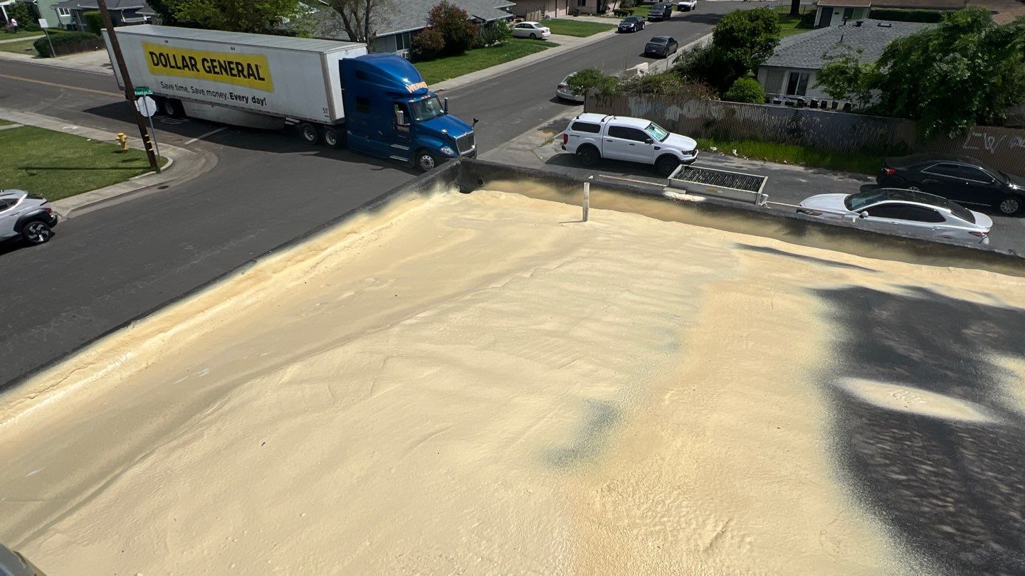 Foam Refurbish using Conklin Benchmark/PUMA XL coatings and spray foam by Straight Edge Roofing Inc