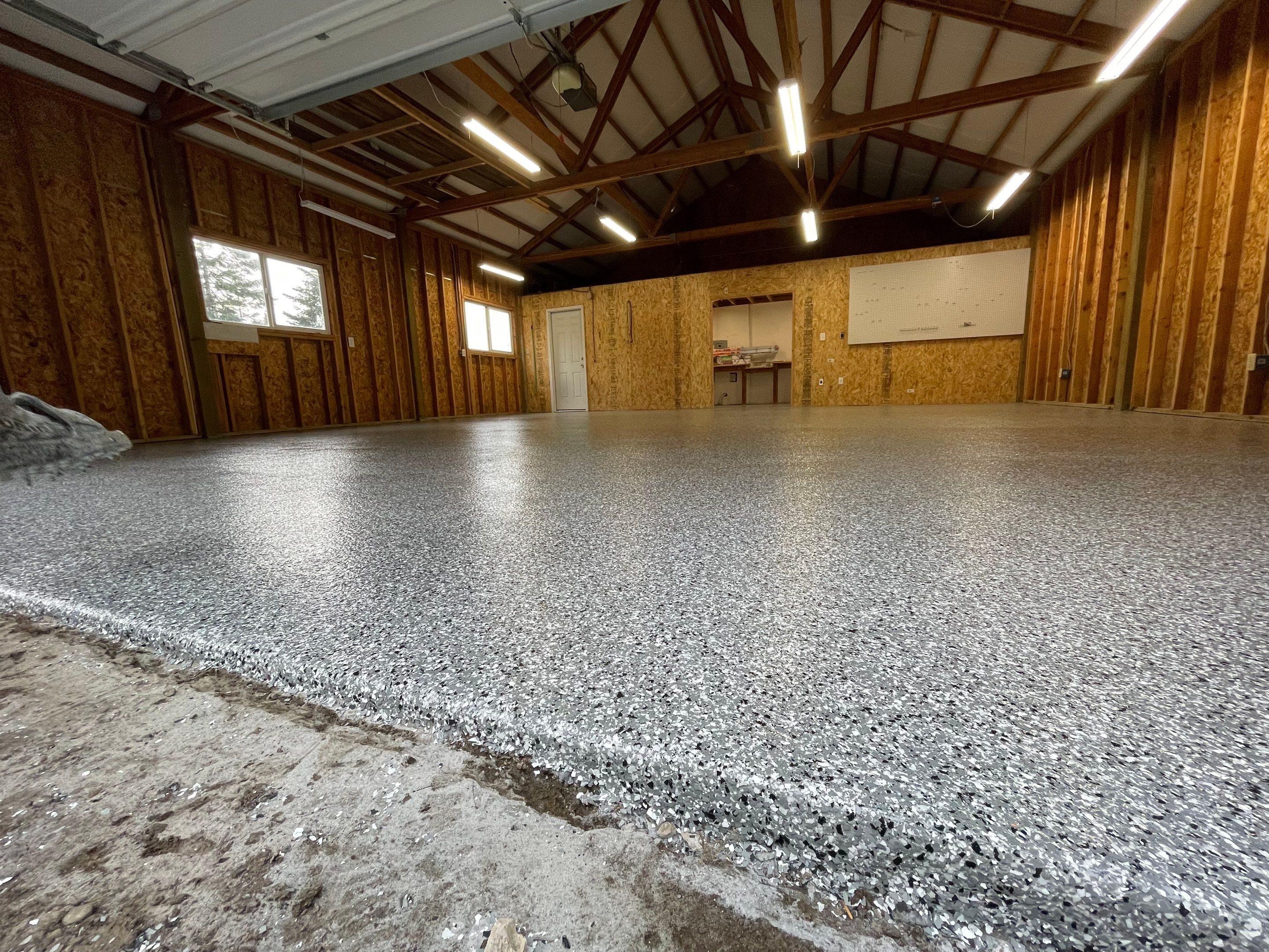 Garage Transformation using Penntek Evolution System and Smoke Color by Croc Coatings, LLC