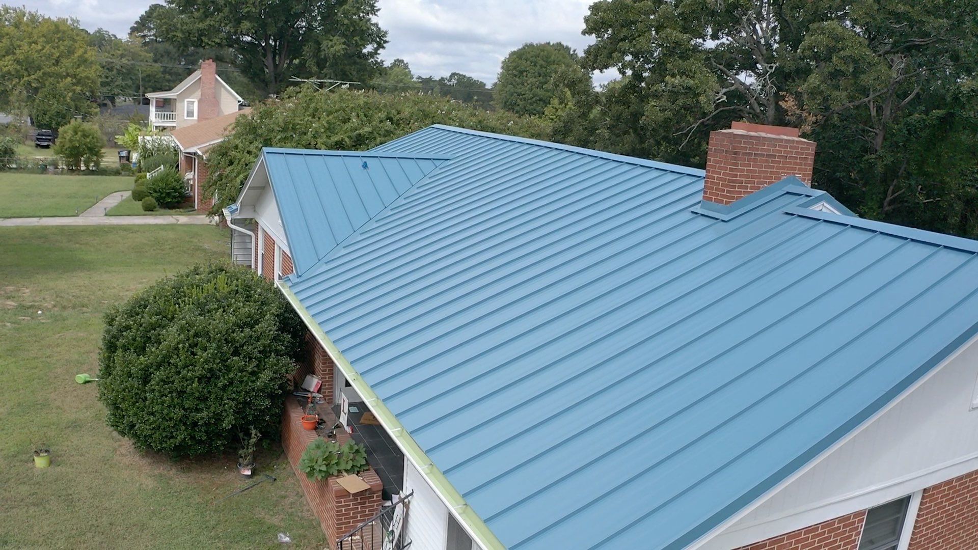 Carolina Blue Standing Seam Roof by Just In Time Roofing and Restoration