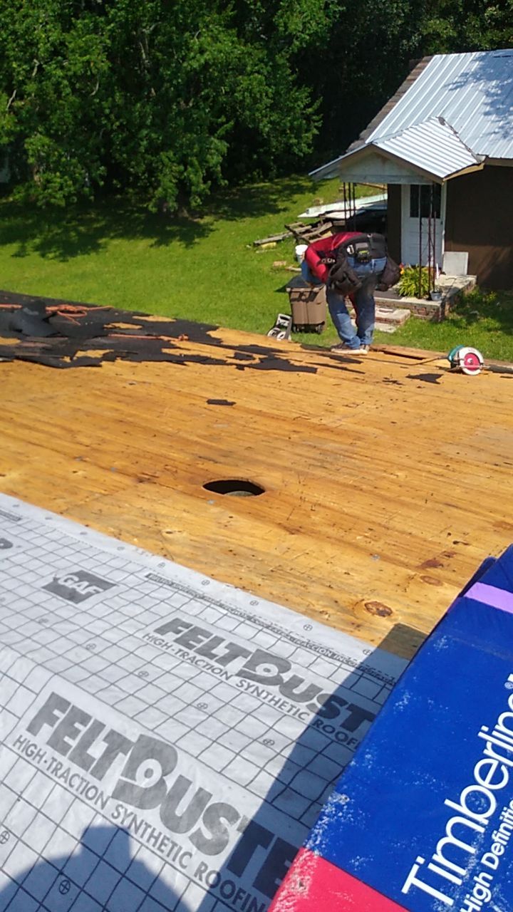 Residential Roofing Installation using Roof Replacement by American Roofing & Construction LLC