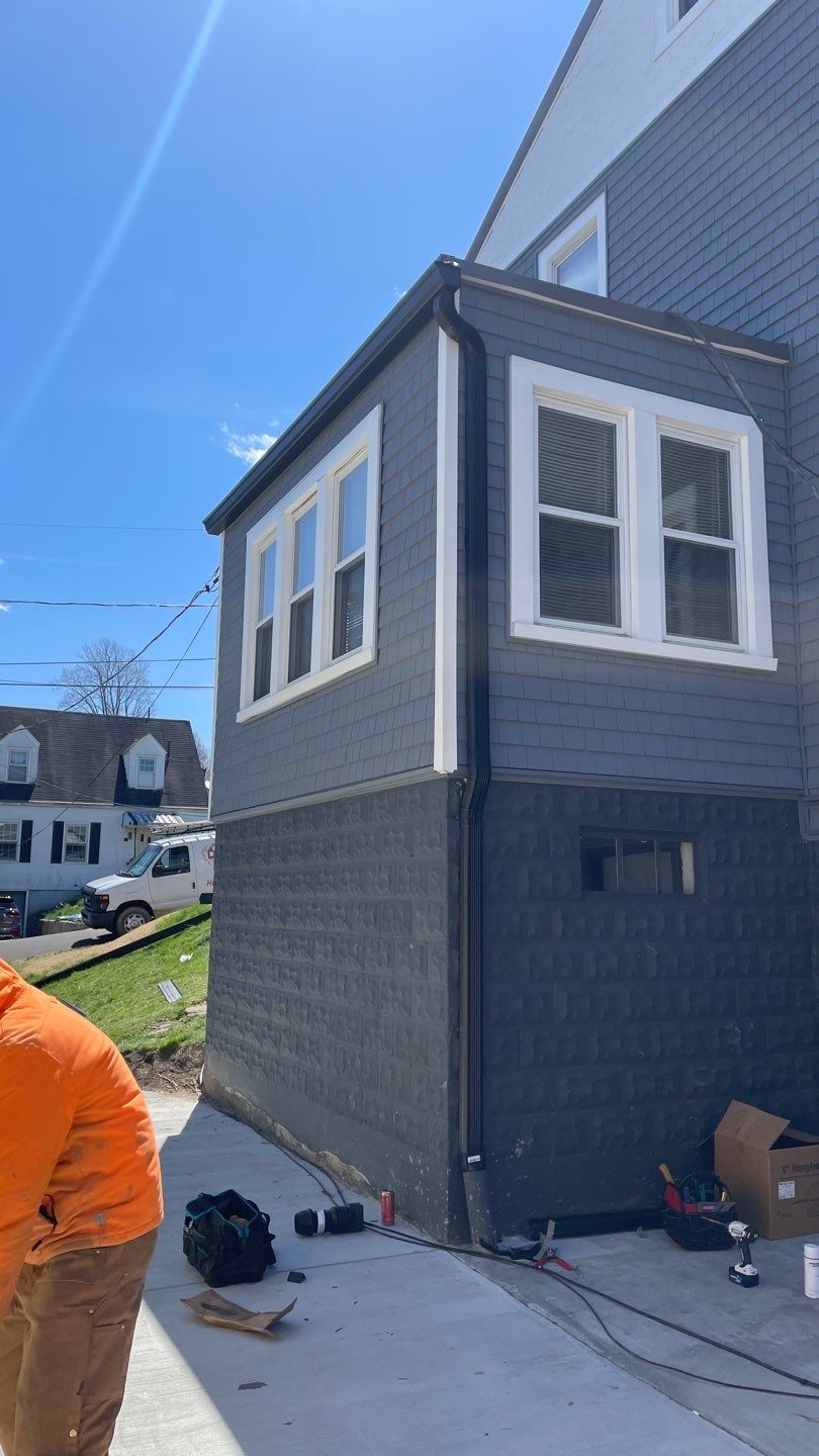 Siding Installation using Exterior Portfolio Portsmouth Vinyl Cedar Shakes by Secure Construction Company Inc