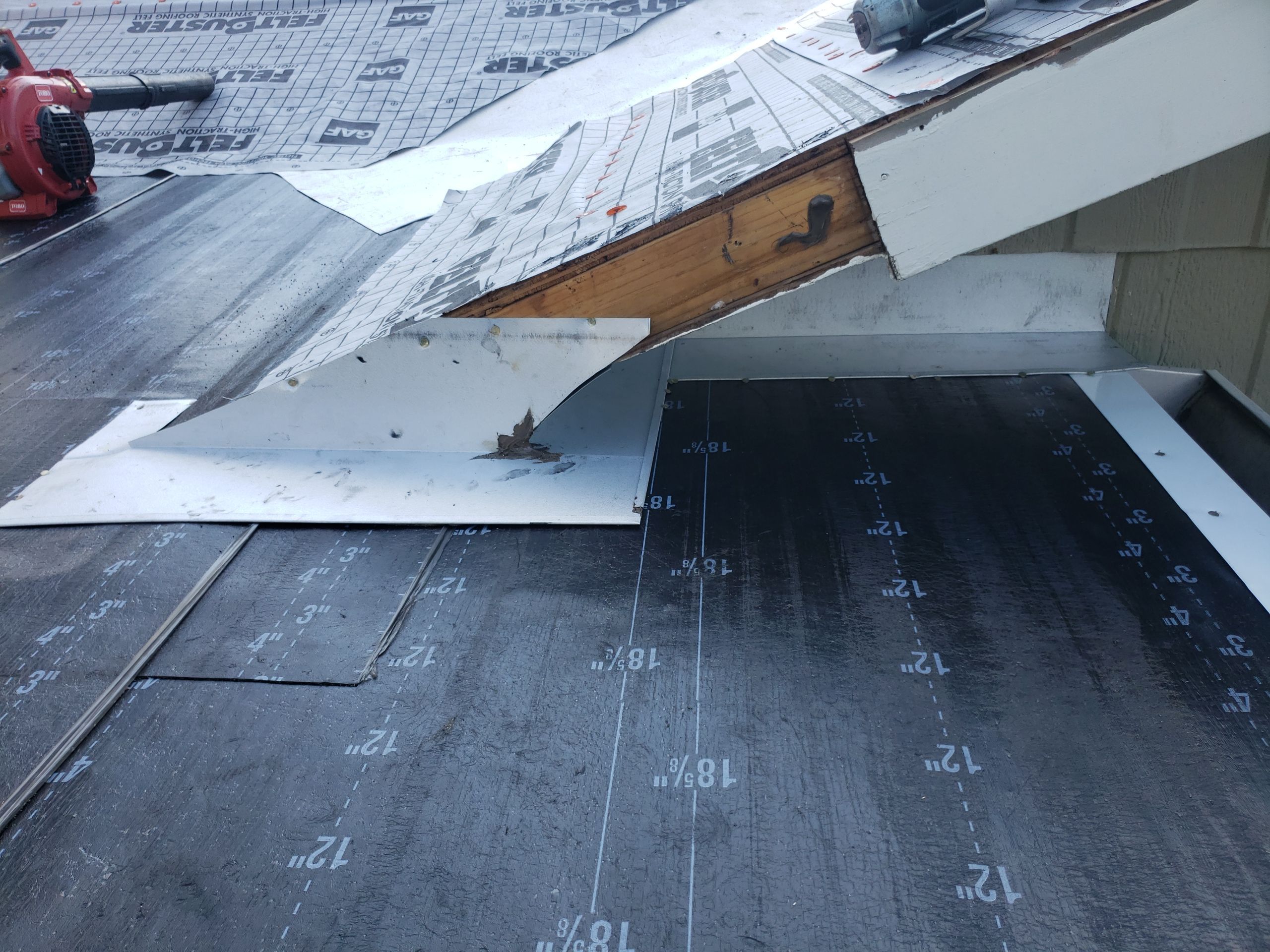 Residential Roofing Installation using Roof Replacement by American Roofing & Construction LLC