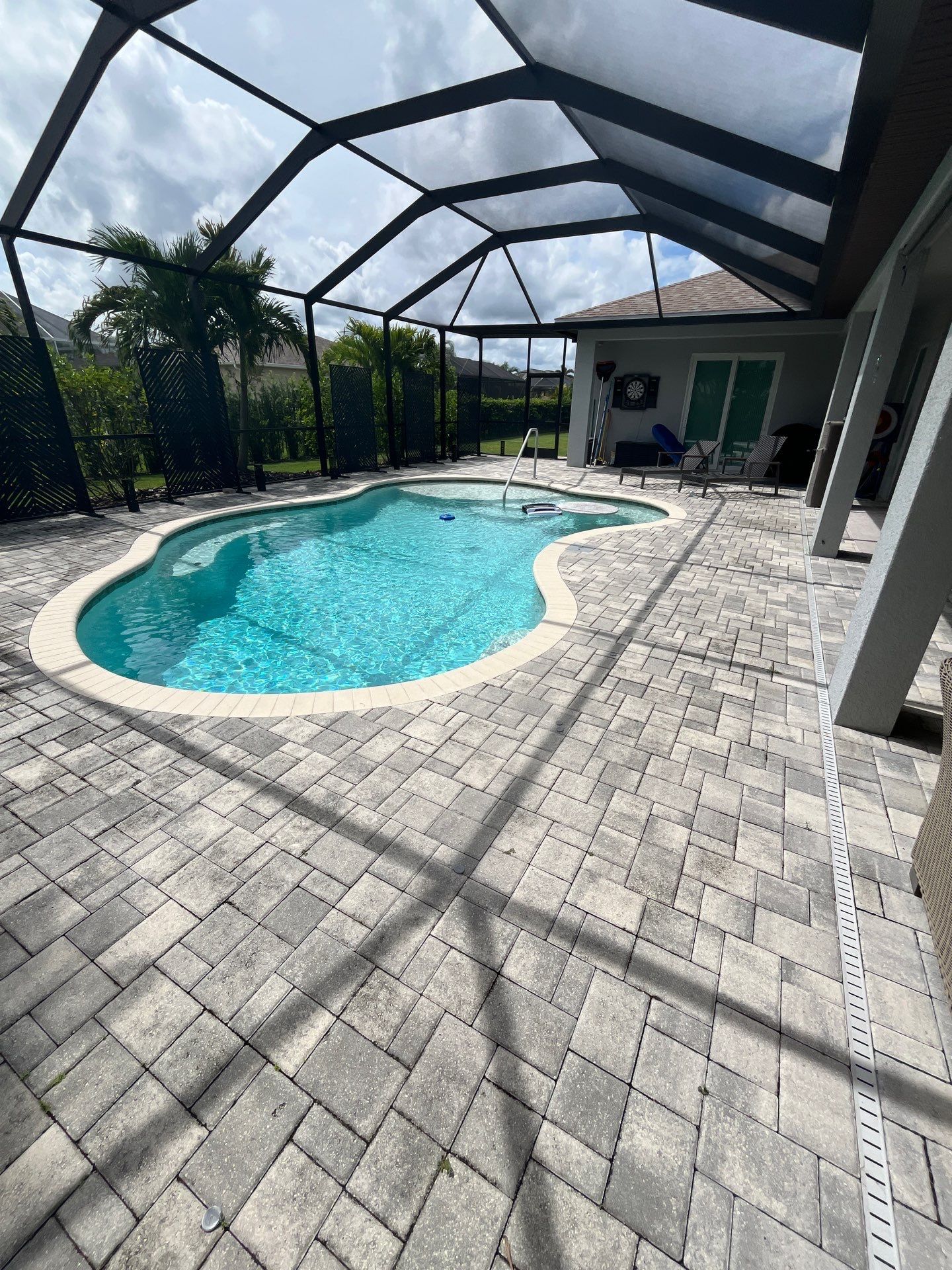 Residential Paver Sealing for Driveway and Pool Deck in La Paloma Sun City Center by Supreme Paver Experts