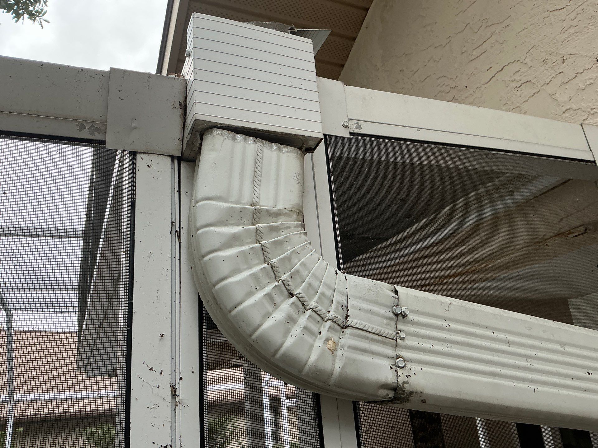 Seamless Aluminum Gutter Installation using 6 Inch Seamless Gutters in Sarasota FL by Gutter Professors