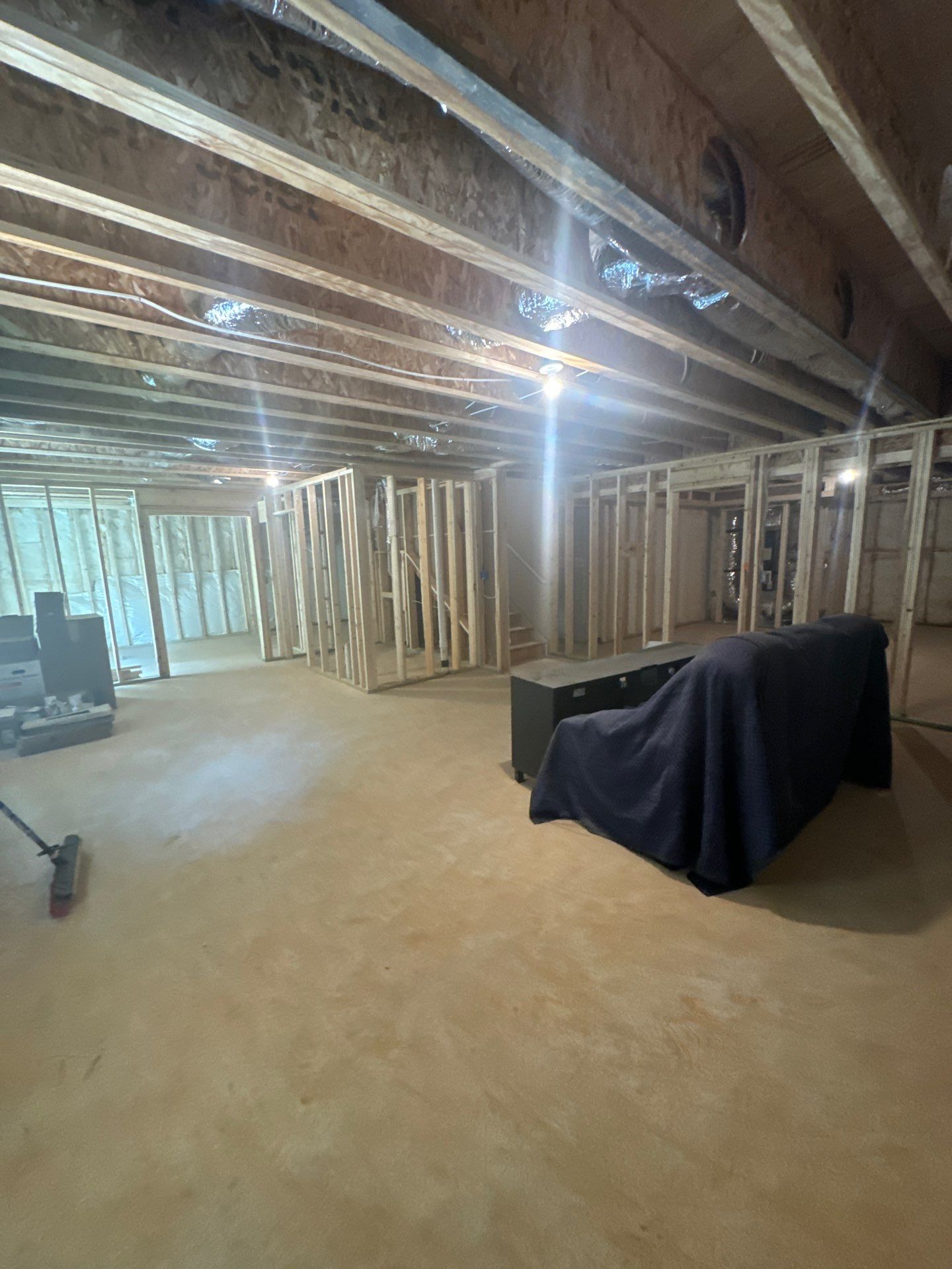 Finished Basement in Acworth Featuring a Full Bathroom and Bar by Swift Home Renovations