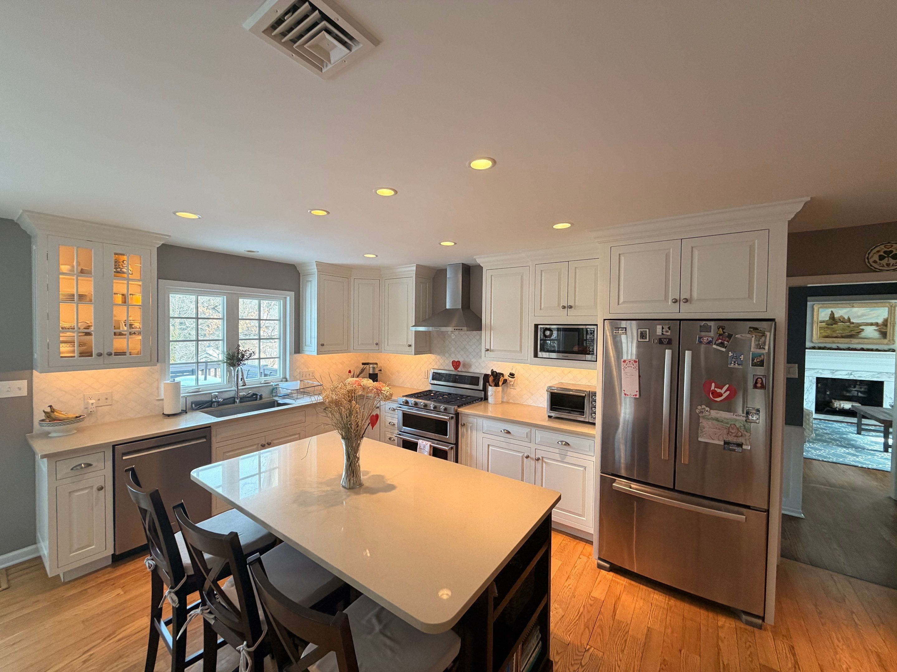 A Smooth, Factory Finish Kitchen Cabinet Transformation by Groovy Hues