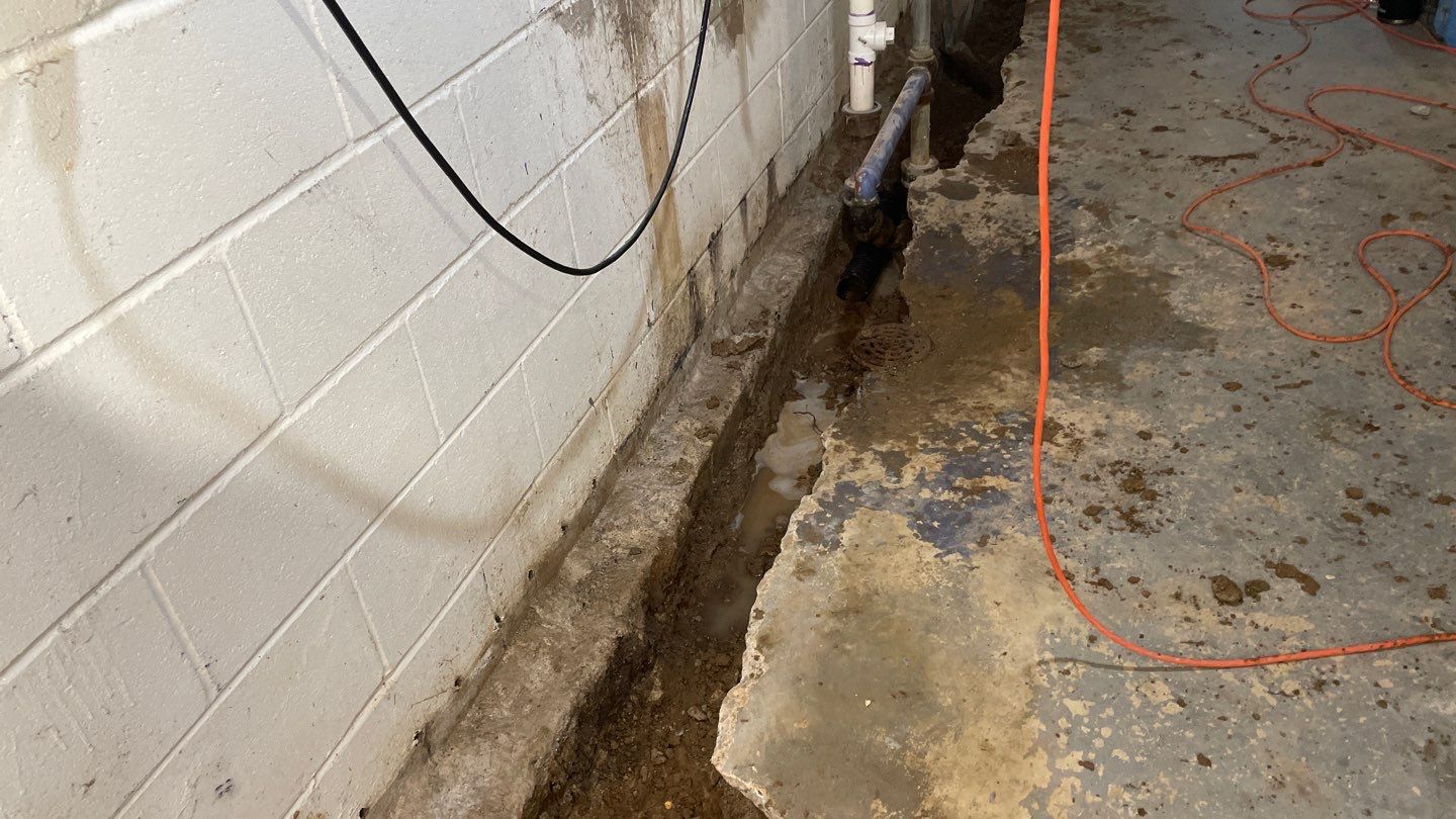 Interior Drain Tile Installation in Columbia Heights, MN by Waterproofing Northeast